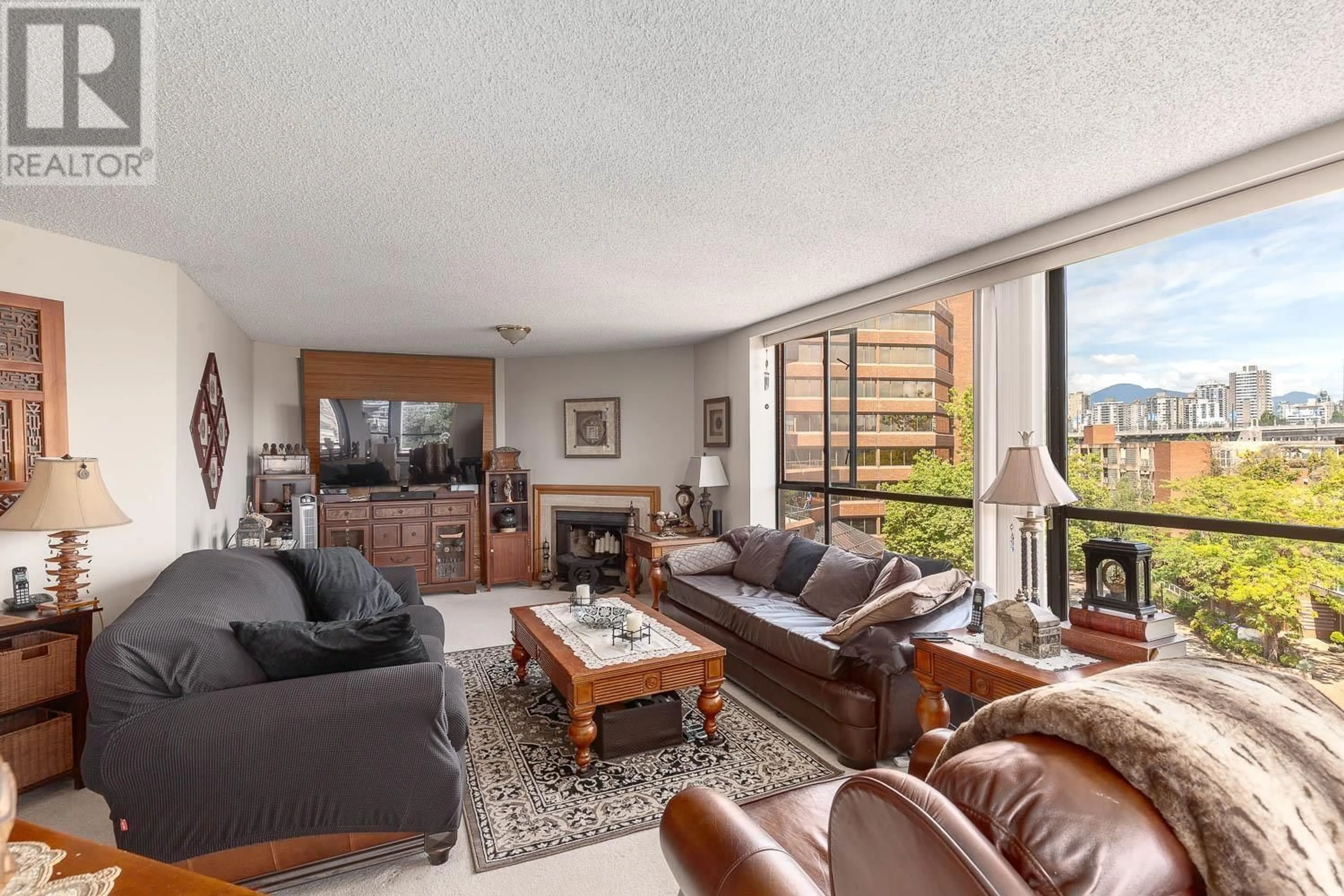 Living room with furniture, unknown for 411 - 1450 PENNYFARTHING DRIVE, Vancouver British Columbia V6J4X8