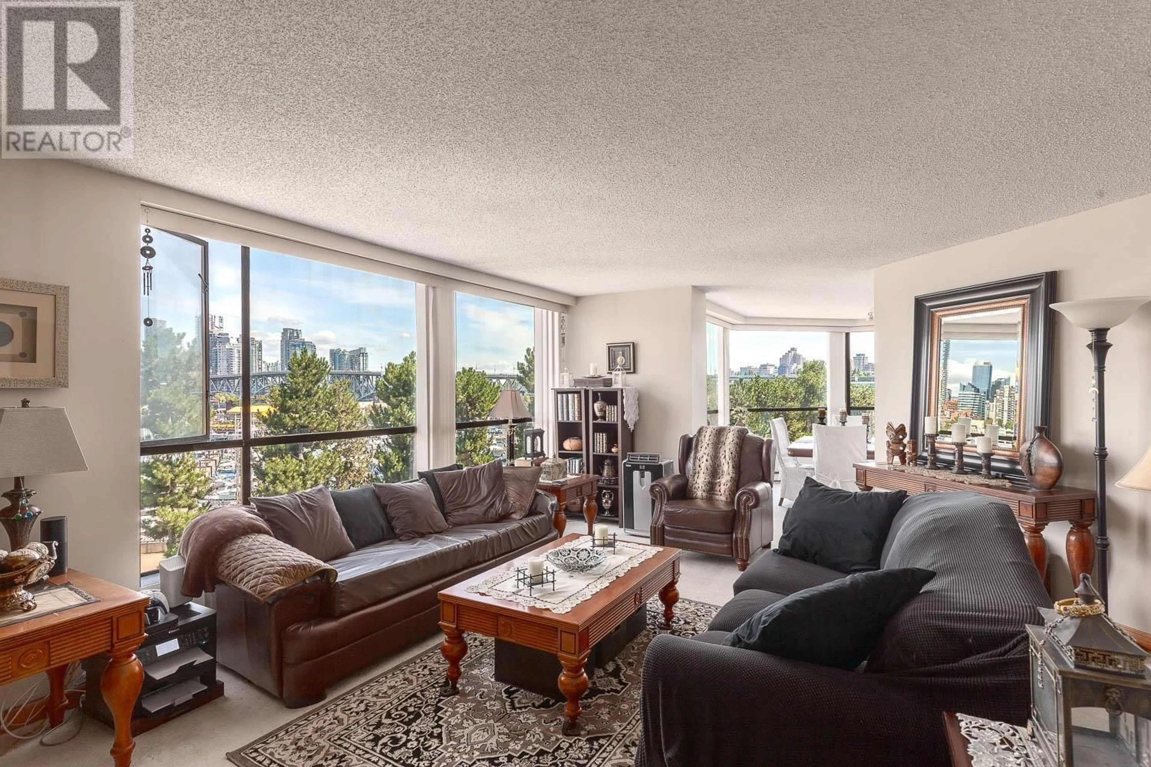Living room with furniture, unknown for 411 - 1450 PENNYFARTHING DRIVE, Vancouver British Columbia V6J4X8