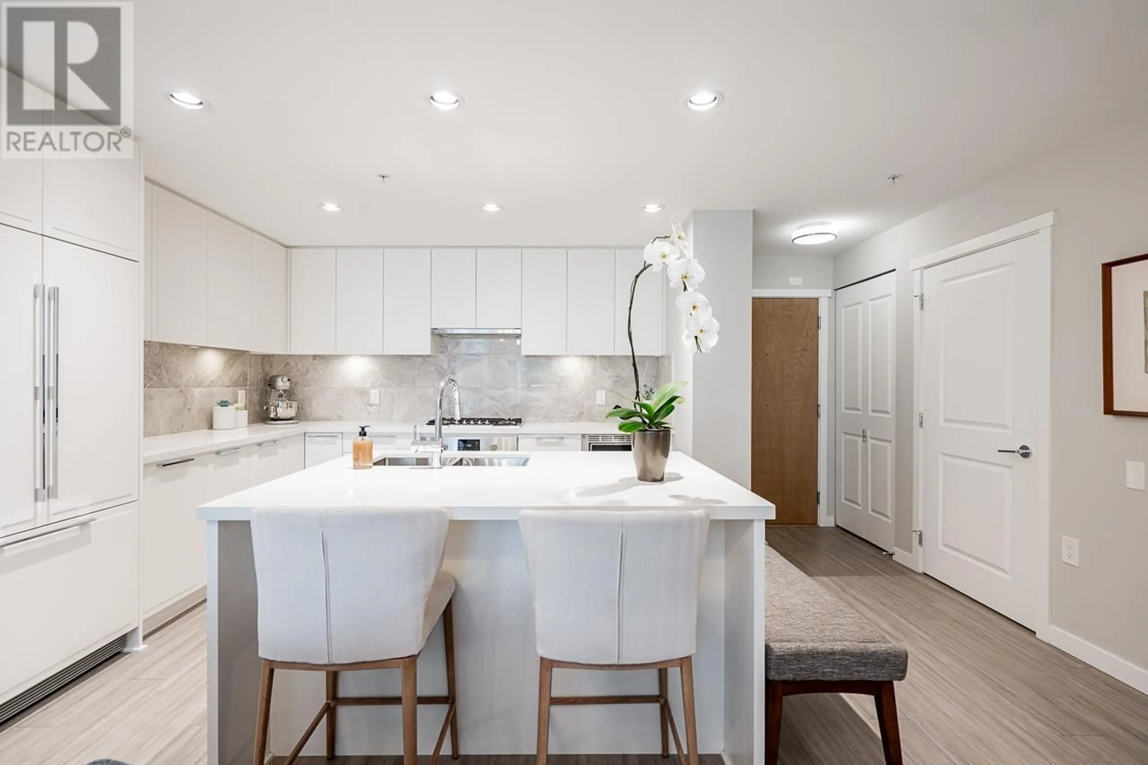 Contemporary kitchen, ceramic/tile floor for 101 3188 RIVERWALK AVENUE, Vancouver British Columbia V5S0E7