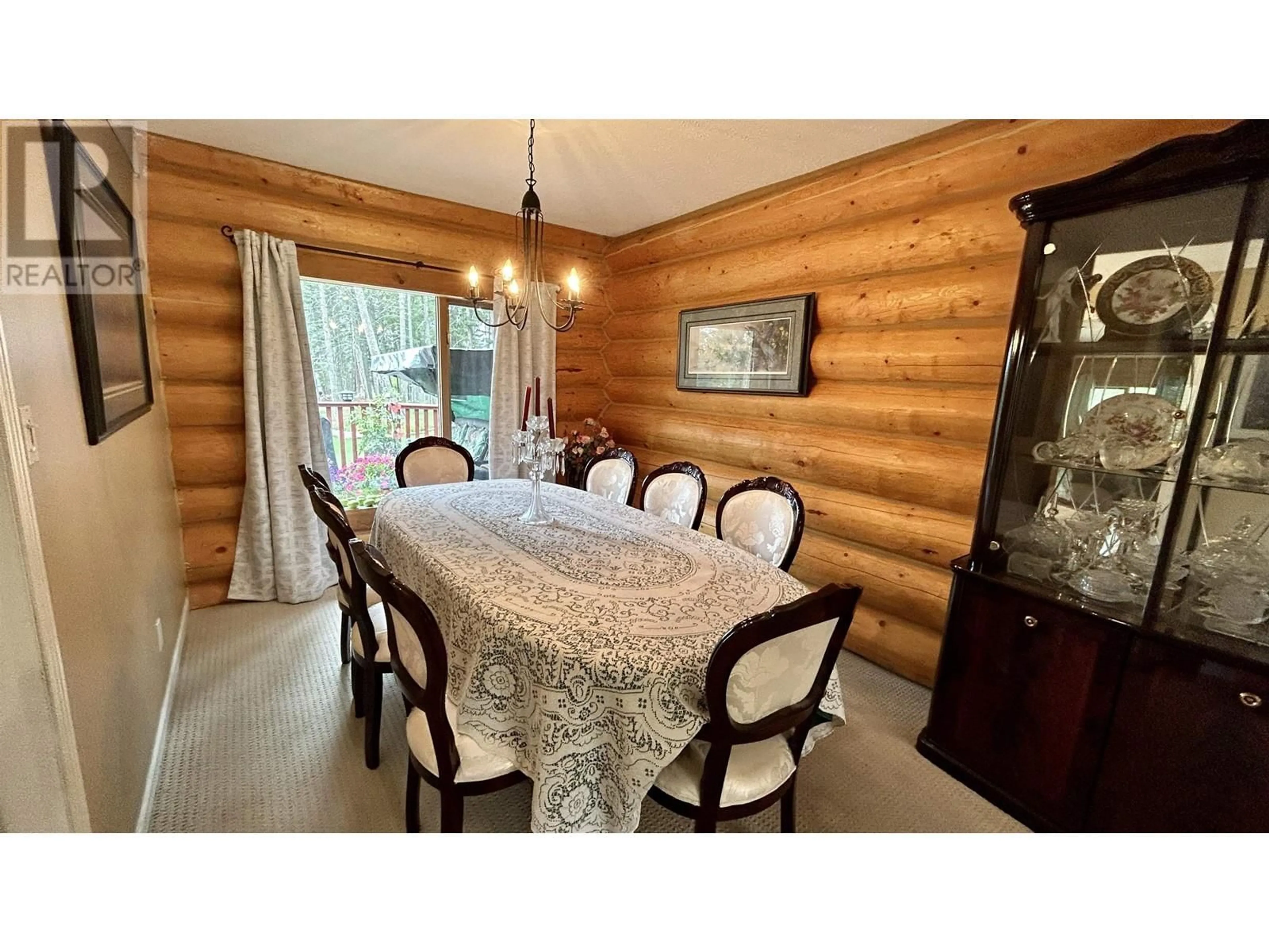 Dining room, wood/laminate floor for 4906 KITWANGA DRIVE, 108 Mile Ranch British Columbia V0K2Z0