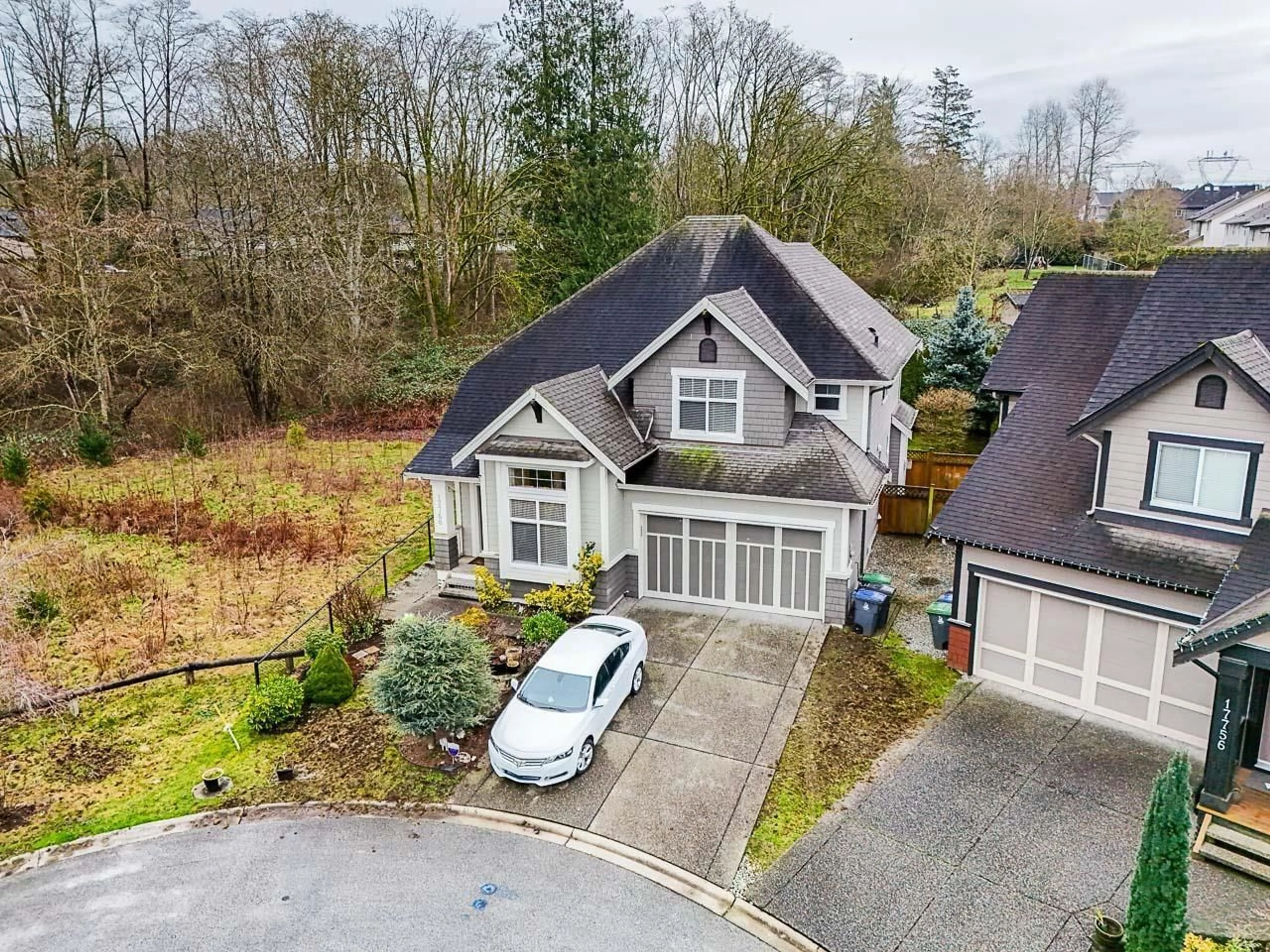 A pic from outside/outdoor area/front of a property/back of a property/a pic from drone, street for 17766 69 AVENUE, Surrey British Columbia V3S2K1