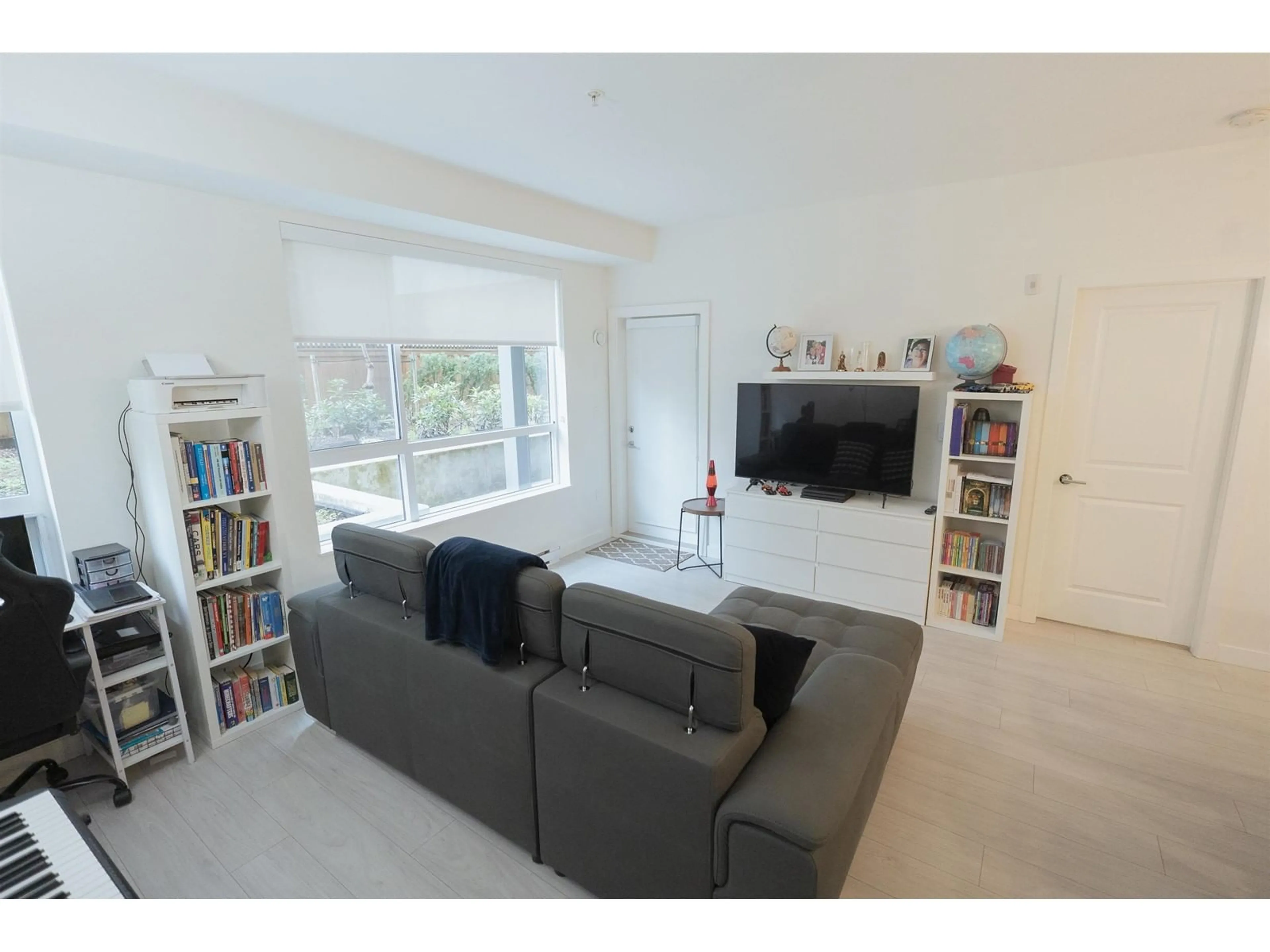 Living room with furniture, unknown for A104 - 20834 80, Langley British Columbia V2Y3M3