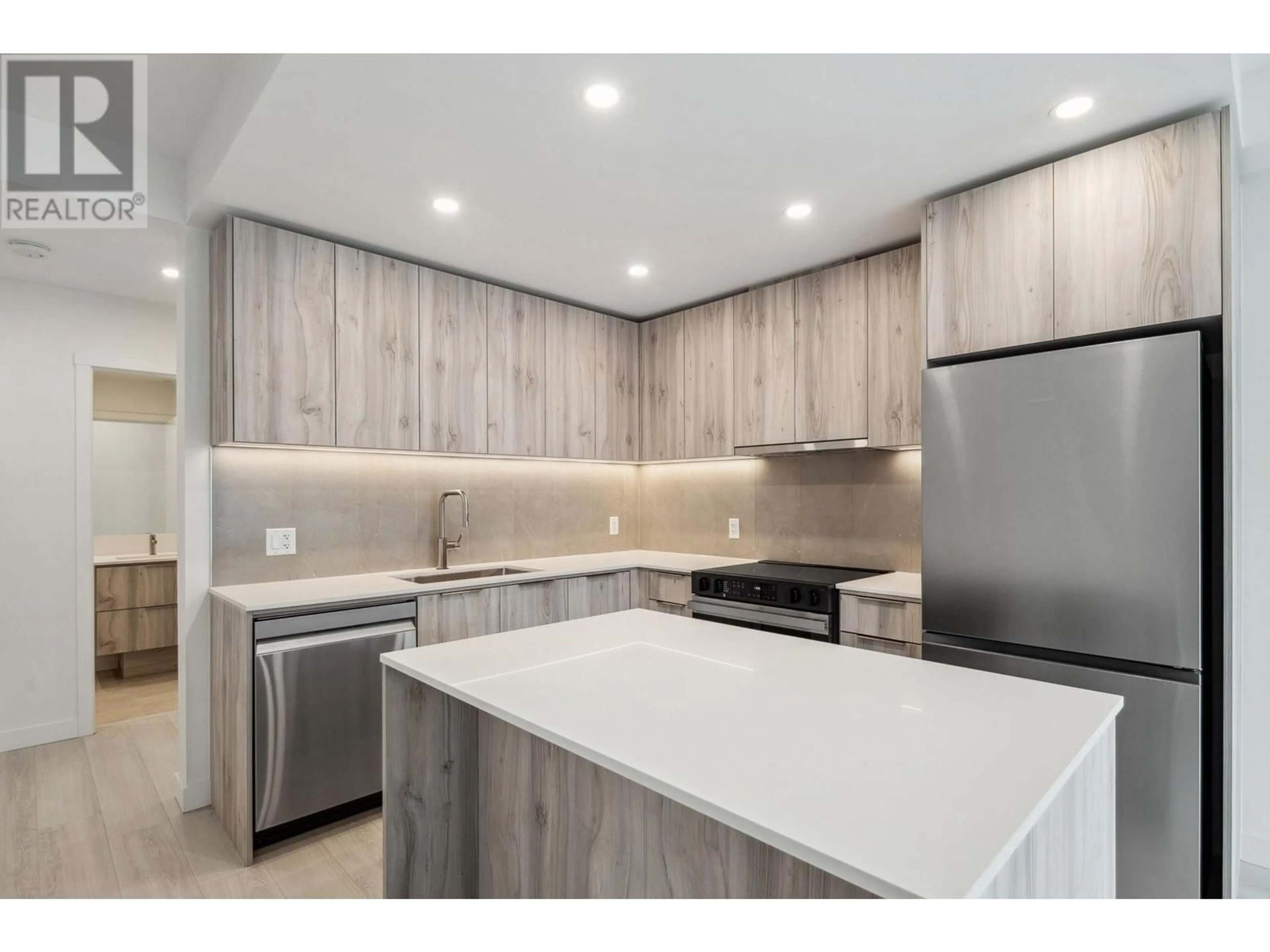 Open concept kitchen, unknown for 313 3596 MALSUM DRIVE, North Vancouver British Columbia V7G0B2