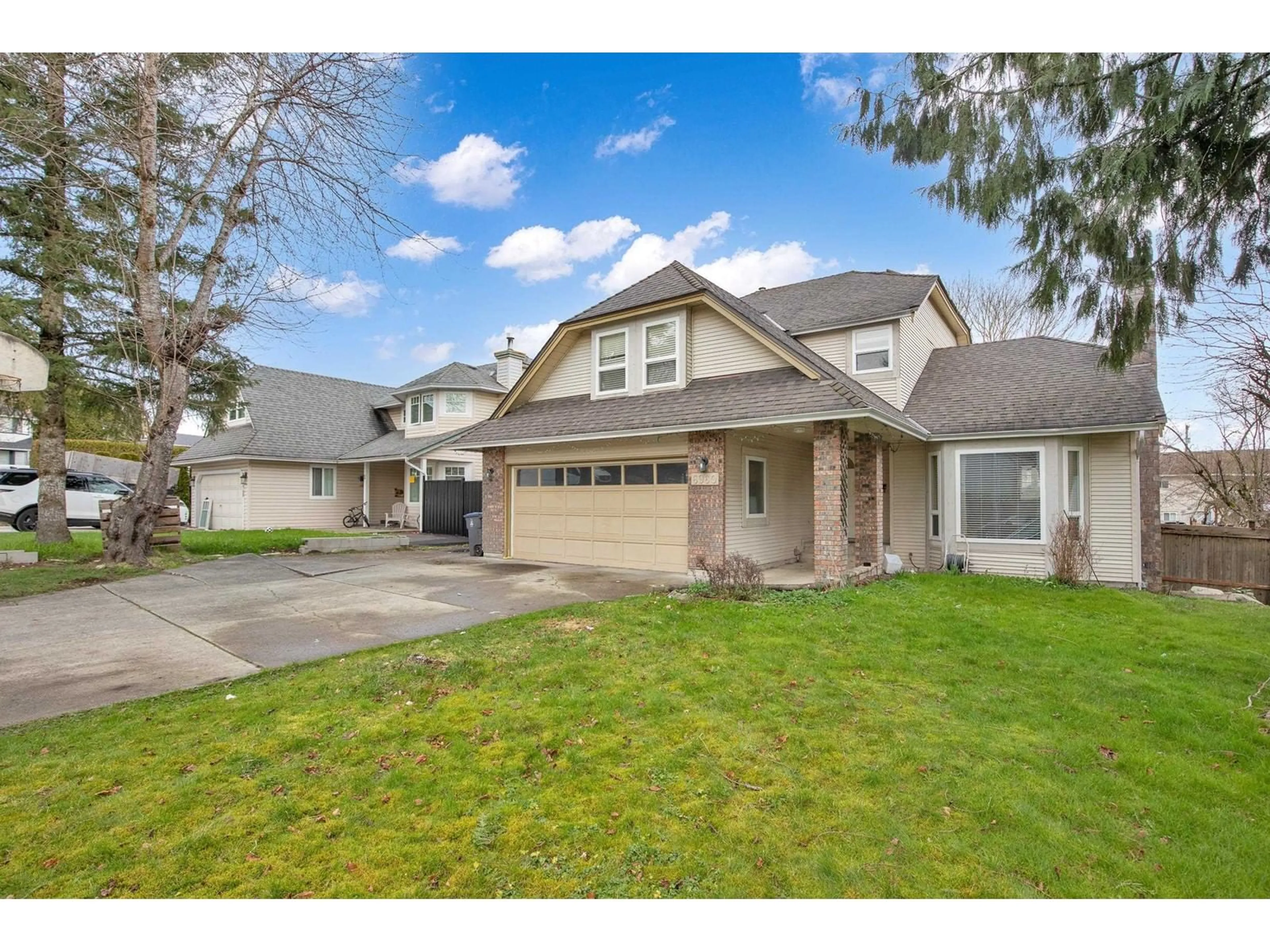 Home with vinyl exterior material, street for 6960 143A, Surrey British Columbia V3W0E3