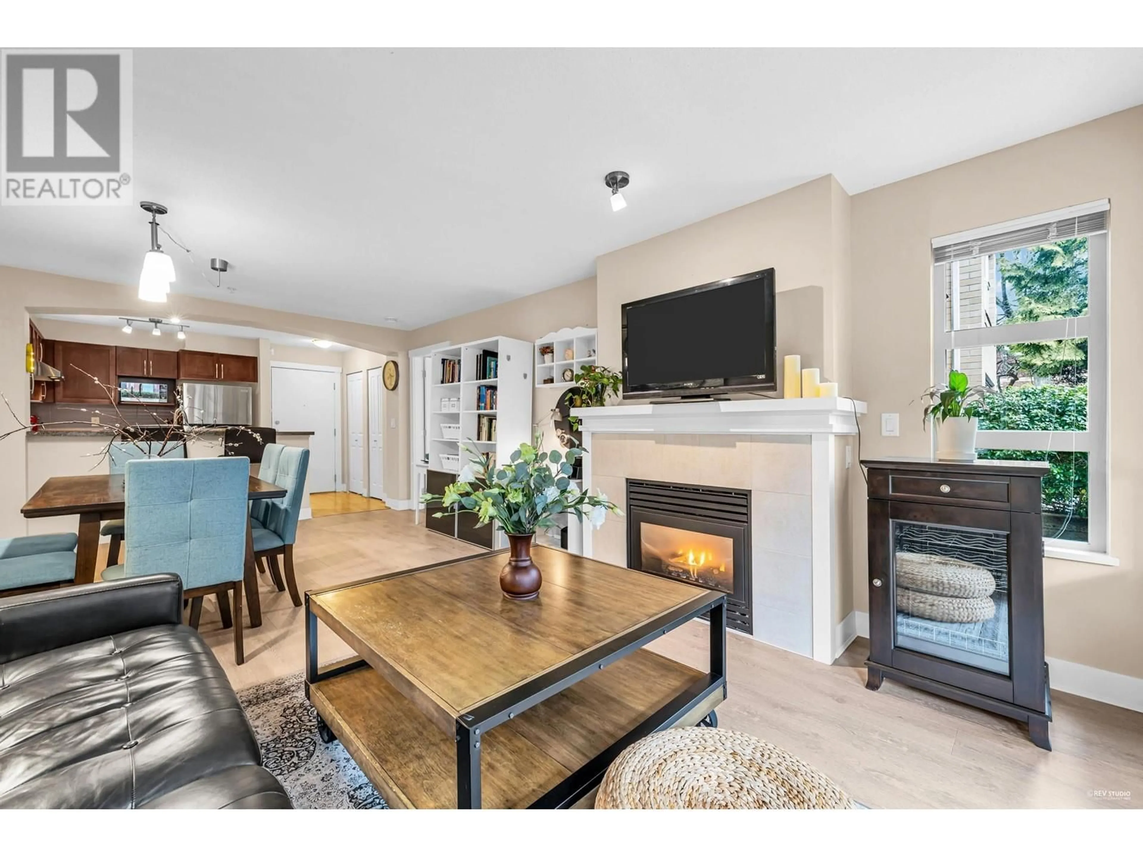 Open concept kitchen, wood/laminate floor for 119 - 5725 AGRONOMY ROAD, Vancouver British Columbia V6T1L9