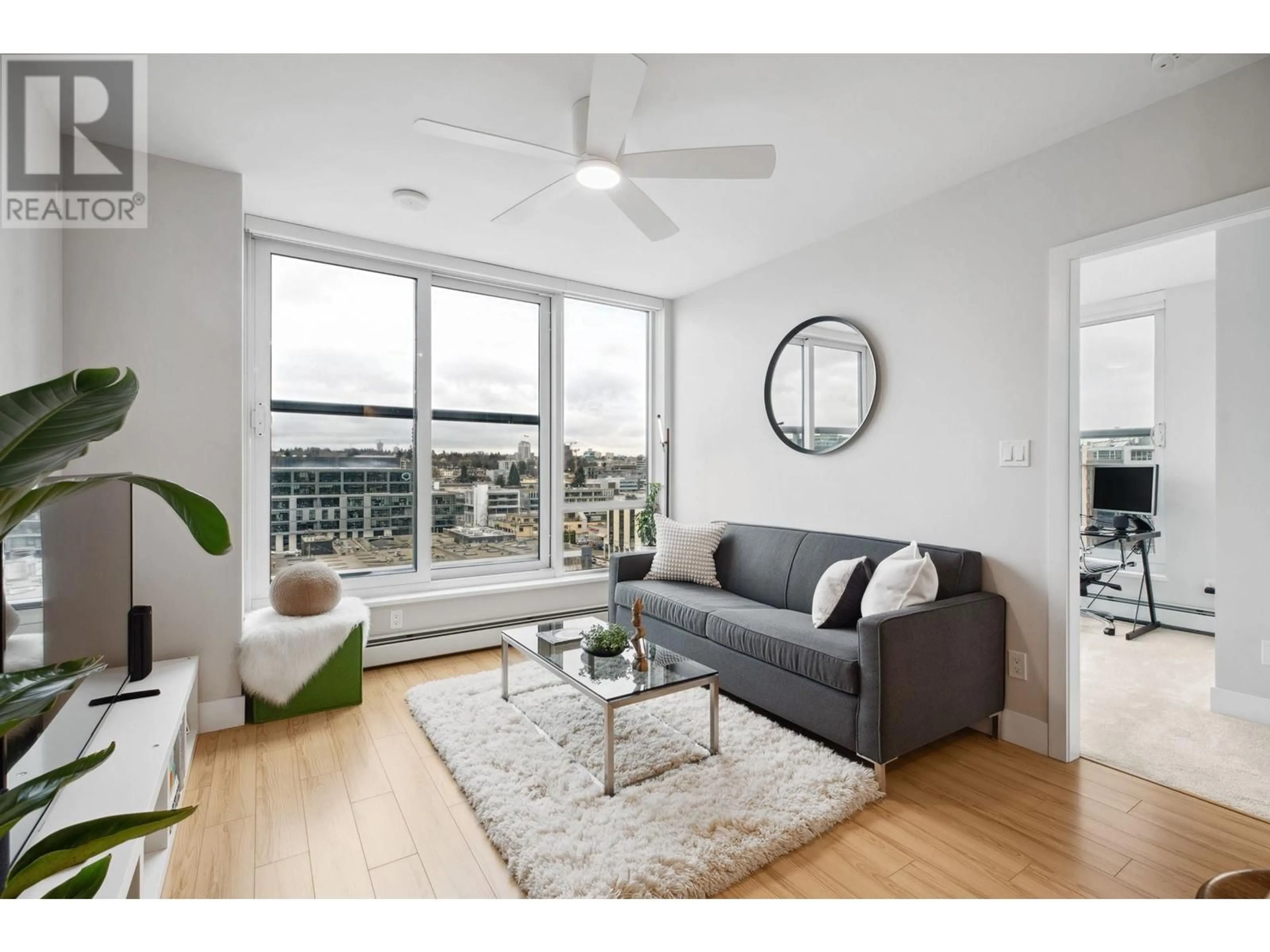 Living room with furniture, wood/laminate floor for 1208 159 W 2ND AVENUE, Vancouver British Columbia V5Y0L8