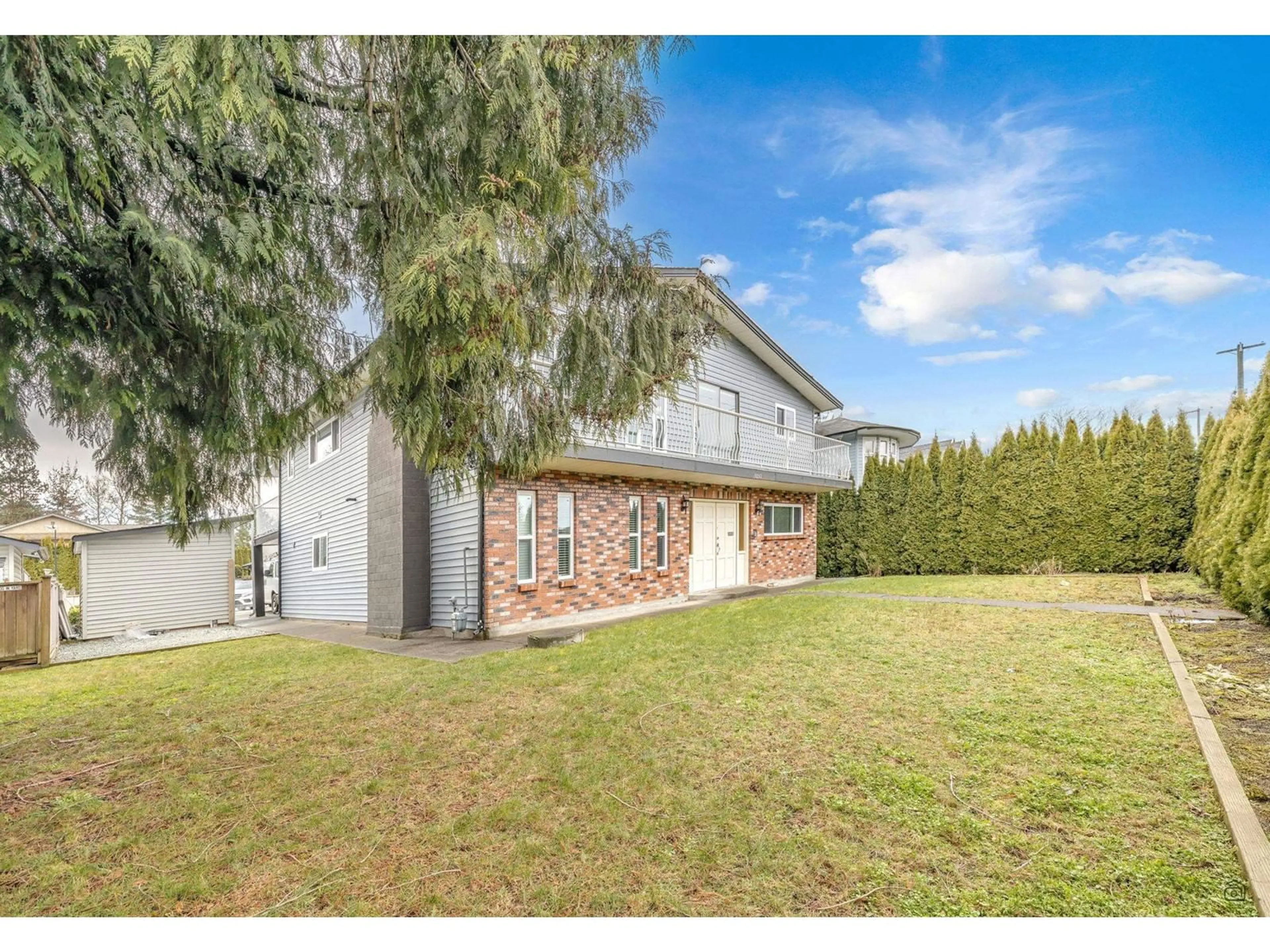 A pic from outside/outdoor area/front of a property/back of a property/a pic from drone, street for 13052 64, Surrey British Columbia V3W1X7