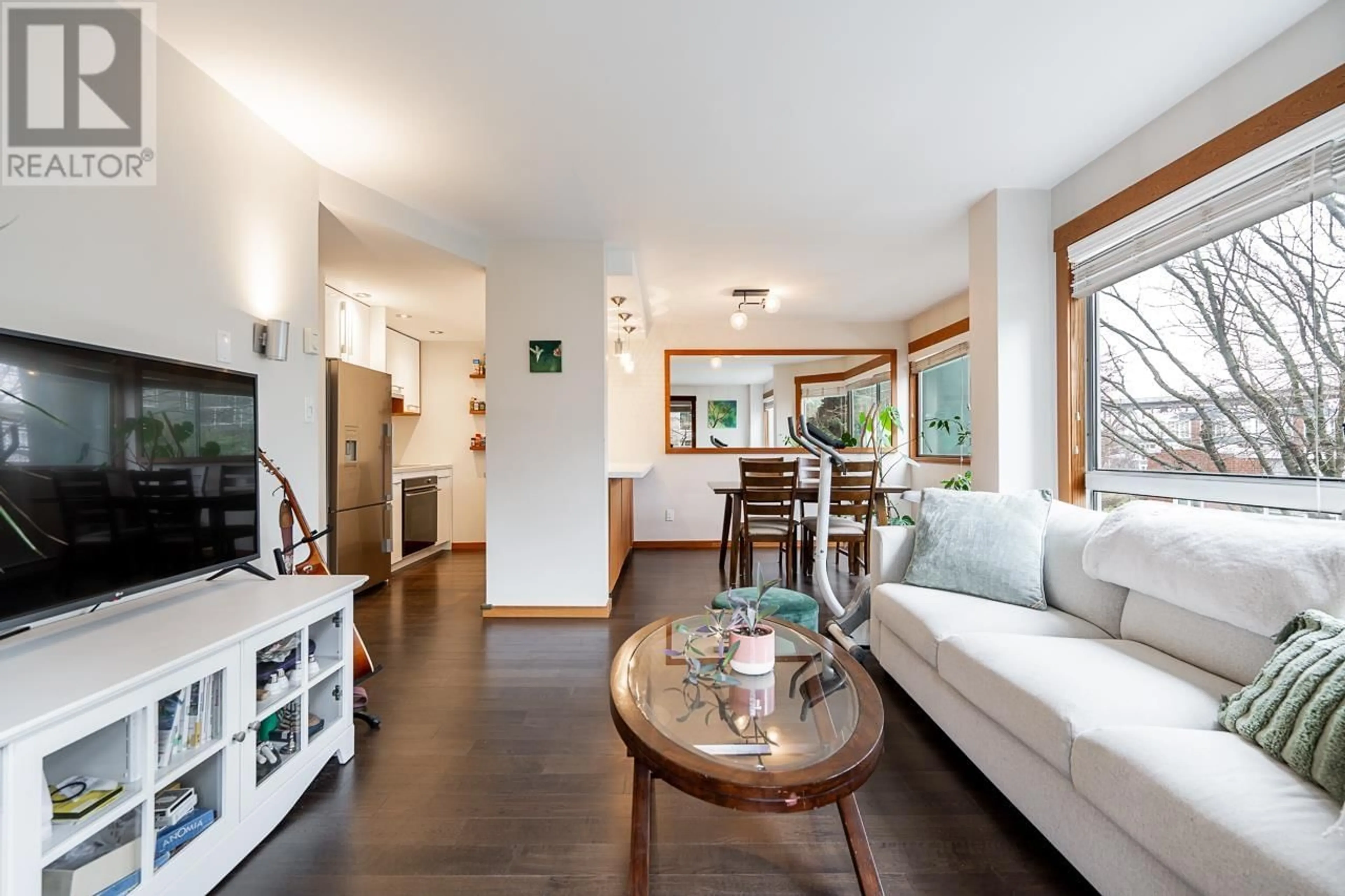 Living room with furniture, wood/laminate floor for 301 1510 W 1ST AVENUE, Vancouver British Columbia V6J4S3