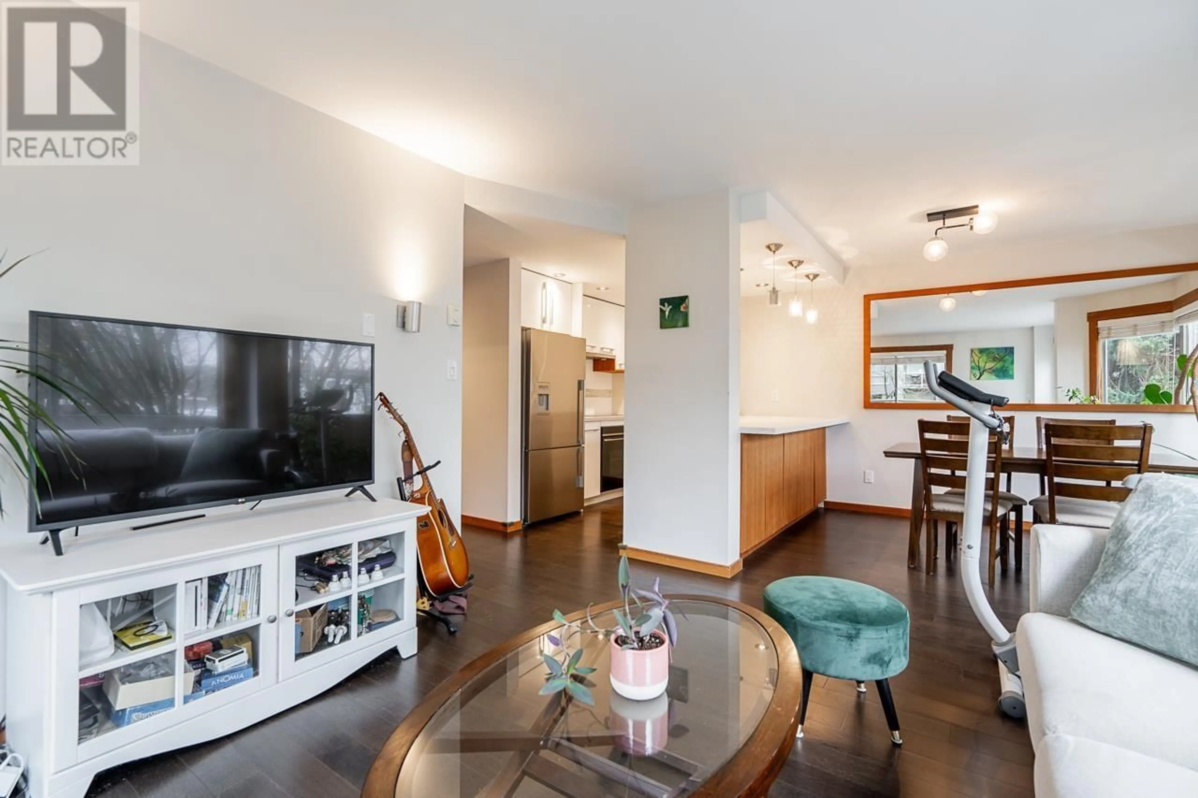 Living room with furniture, wood/laminate floor for 301 1510 W 1ST AVENUE, Vancouver British Columbia V6J4S3