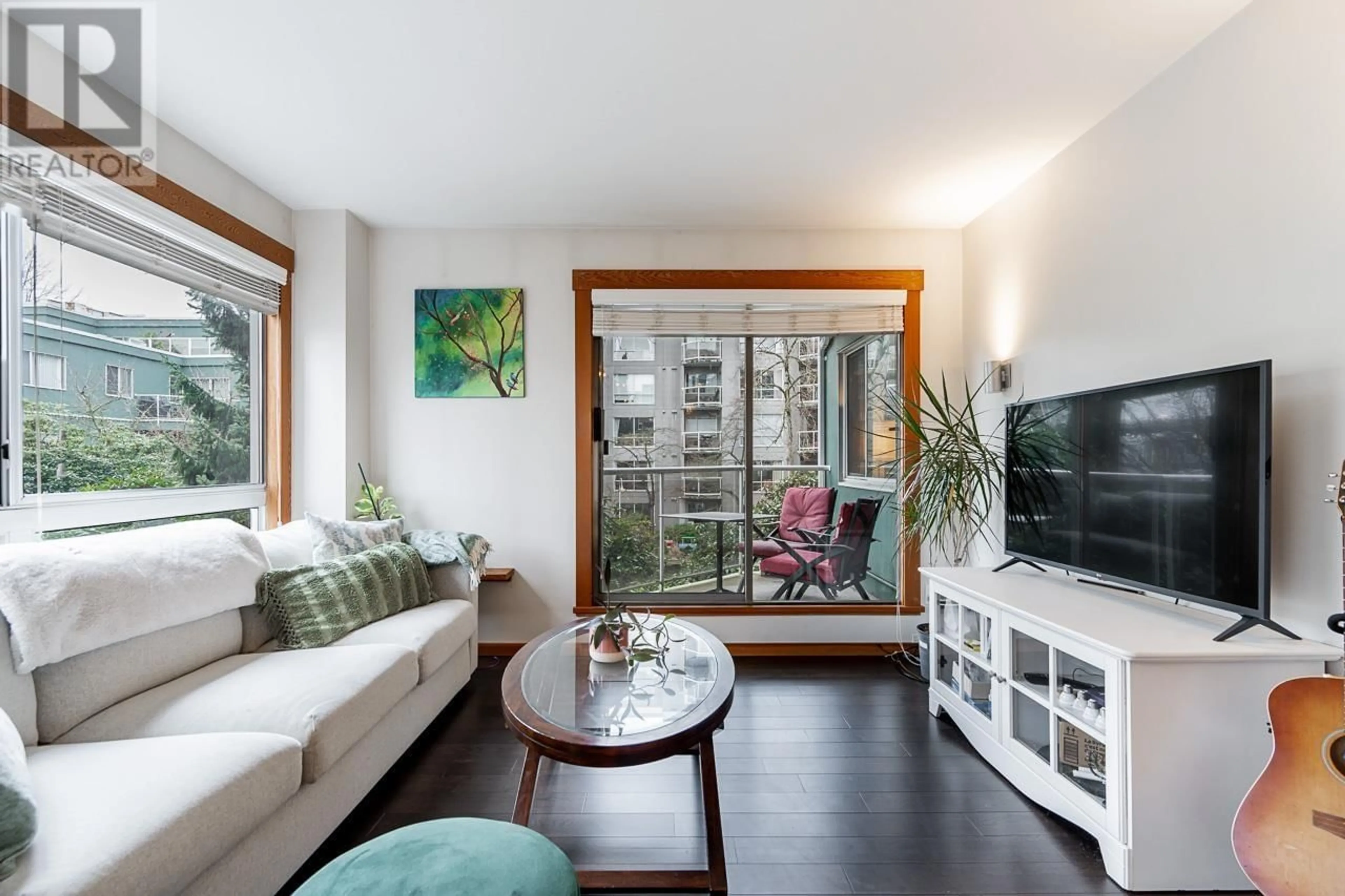 Living room with furniture, wood/laminate floor for 301 1510 W 1ST AVENUE, Vancouver British Columbia V6J4S3