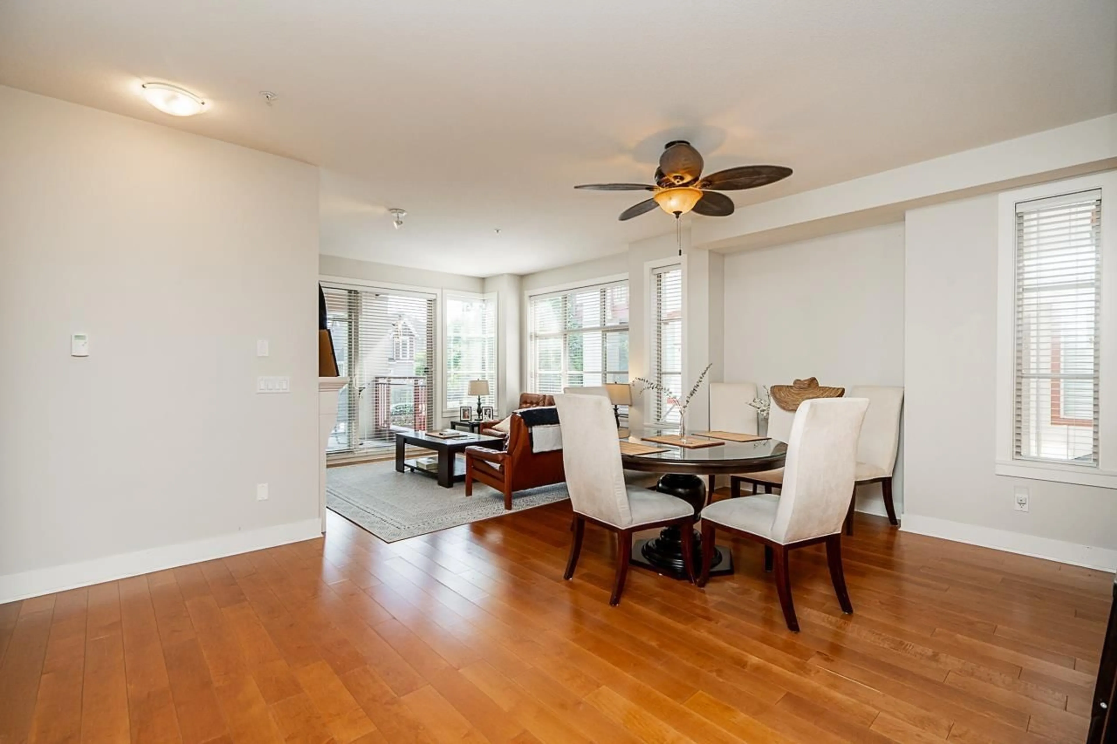 Dining room, wood/laminate floor for 204 - 16469 64, Surrey British Columbia V3S6V7