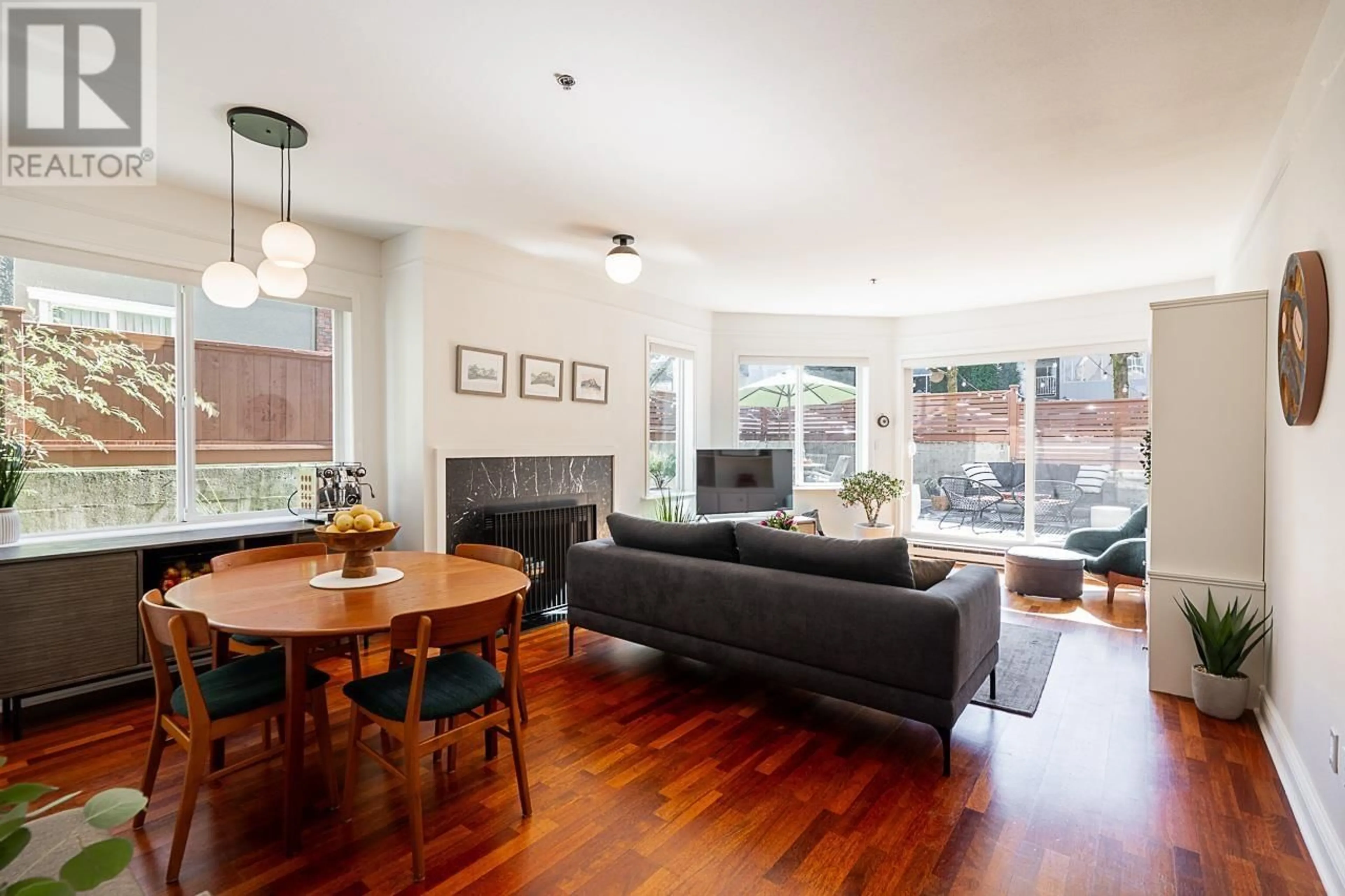 Living room with furniture, wood/laminate floor for 102 1265 W 11TH AVENUE, Vancouver British Columbia V6H1K6