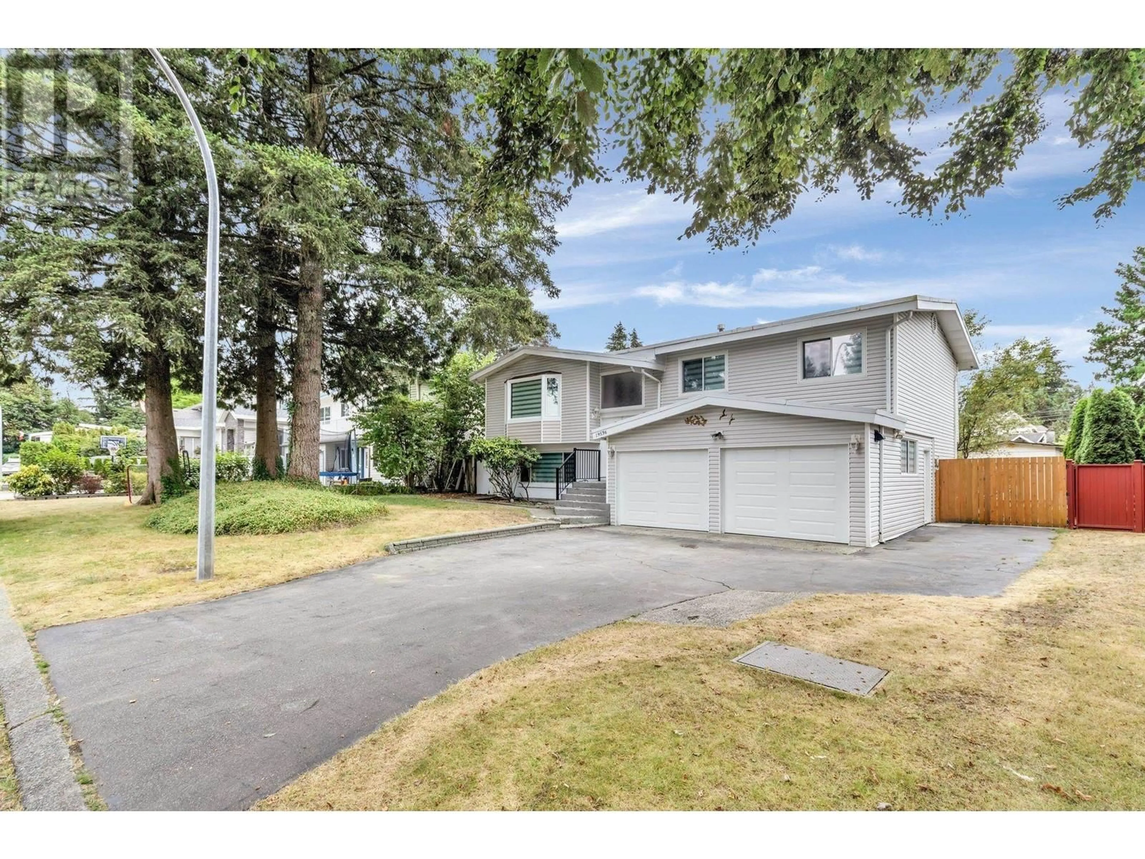 Home with vinyl exterior material, street for 19536 118B AVENUE, Pitt Meadows British Columbia V3Y1L3