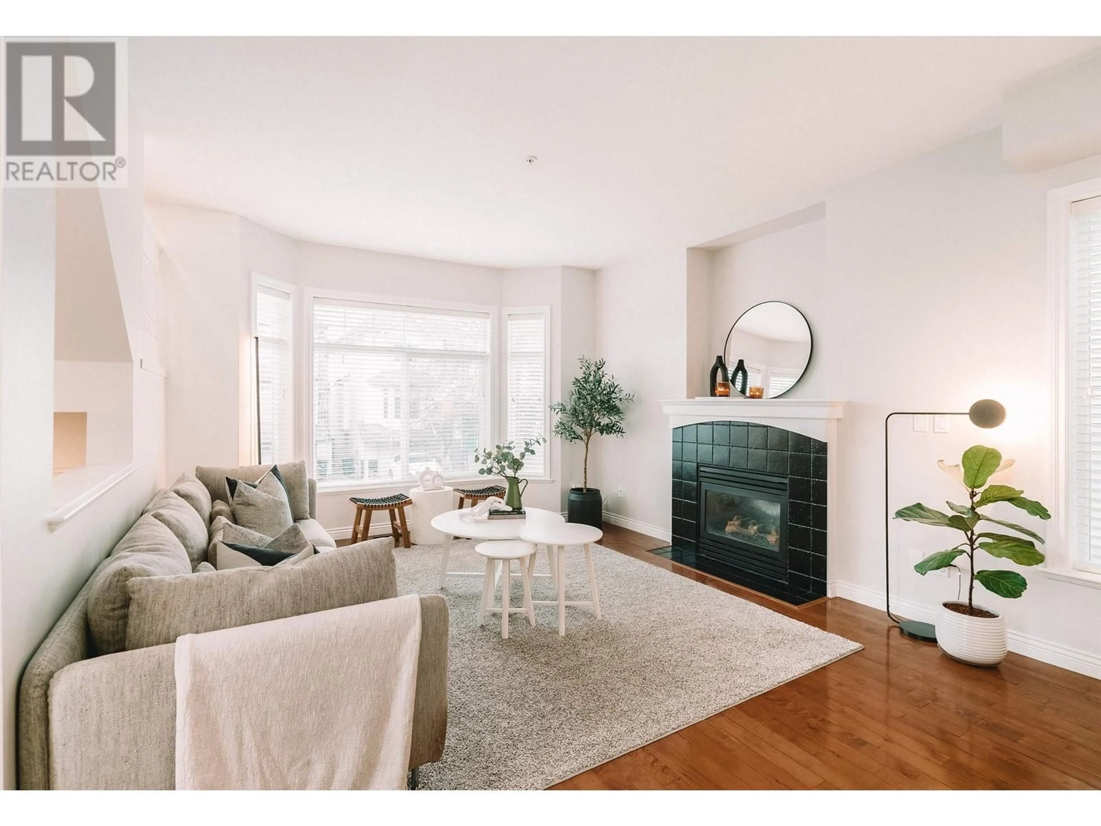 Living room with furniture, wood/laminate floor for 11804 191A STREET, Pitt Meadows British Columbia V3Y0A4