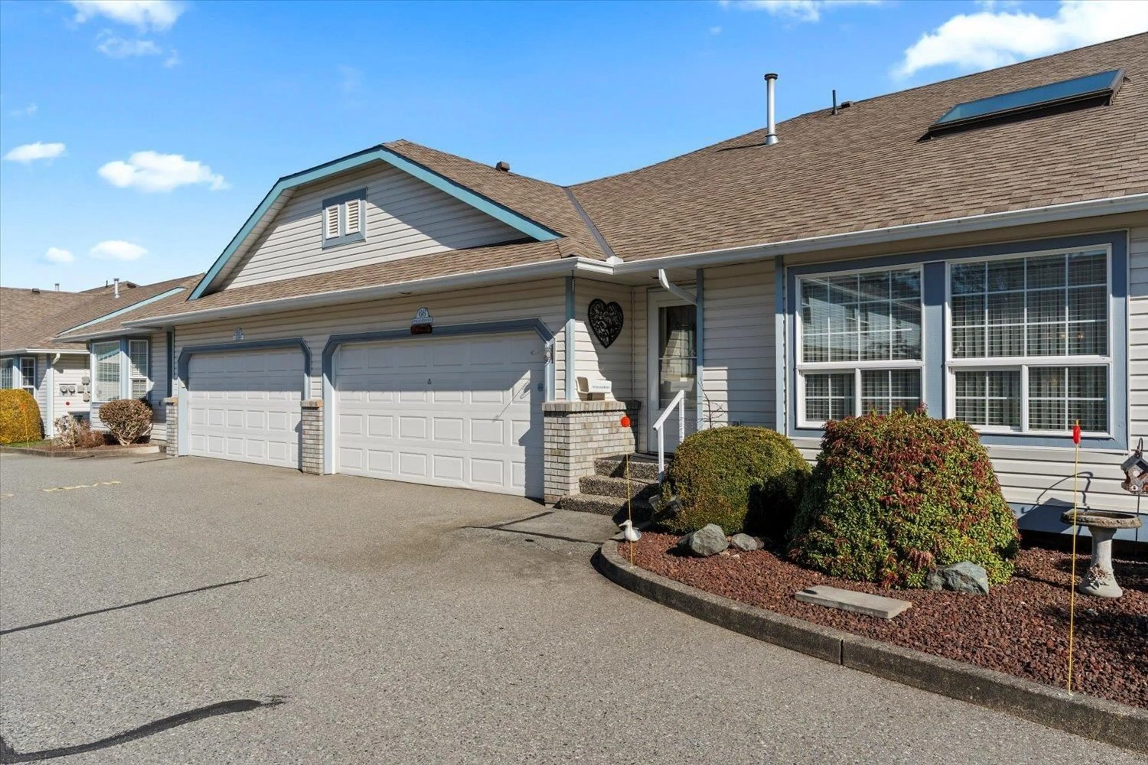 Home with vinyl exterior material, street for 66 45175 WELLS ROAD|Sardis West Vedder, Chilliwack British Columbia V2R3K7