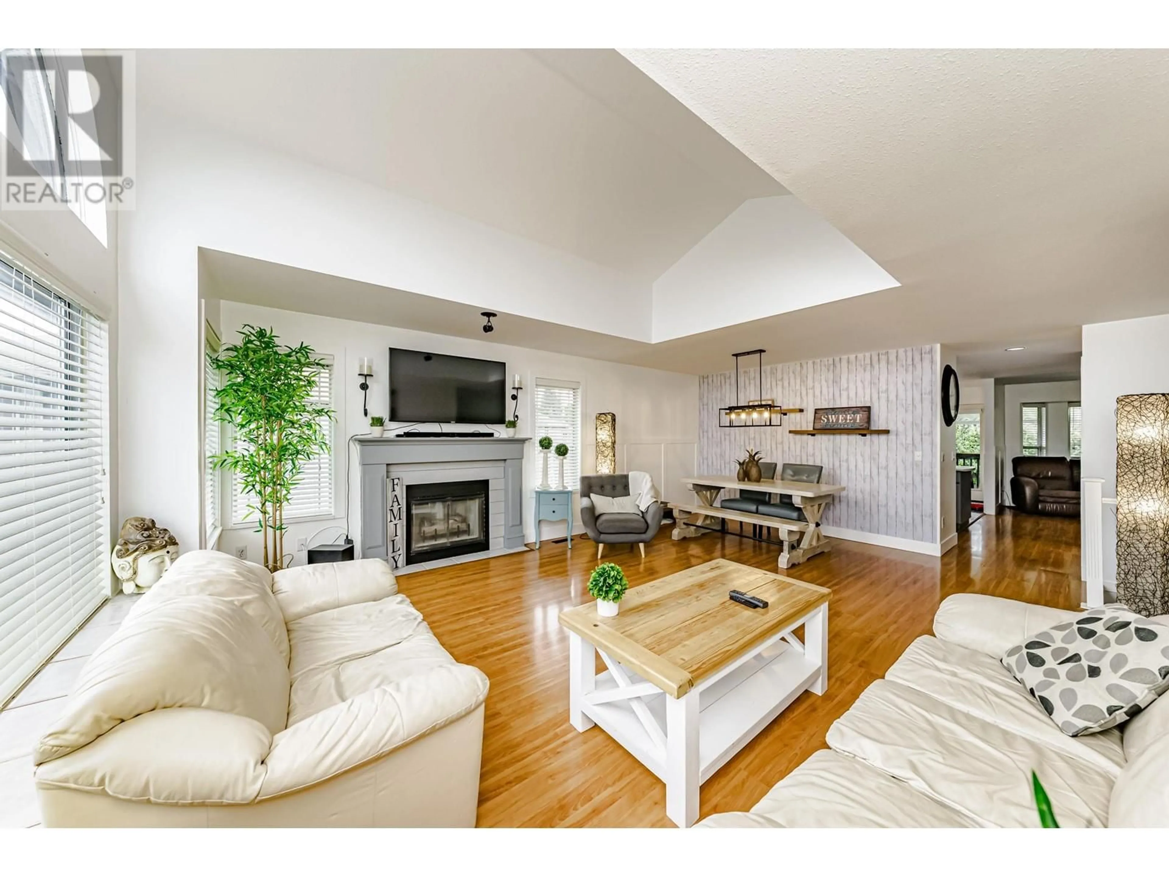 Living room with furniture, wood/laminate floor for 12068 204B STREET, Maple Ridge British Columbia V2X1A9