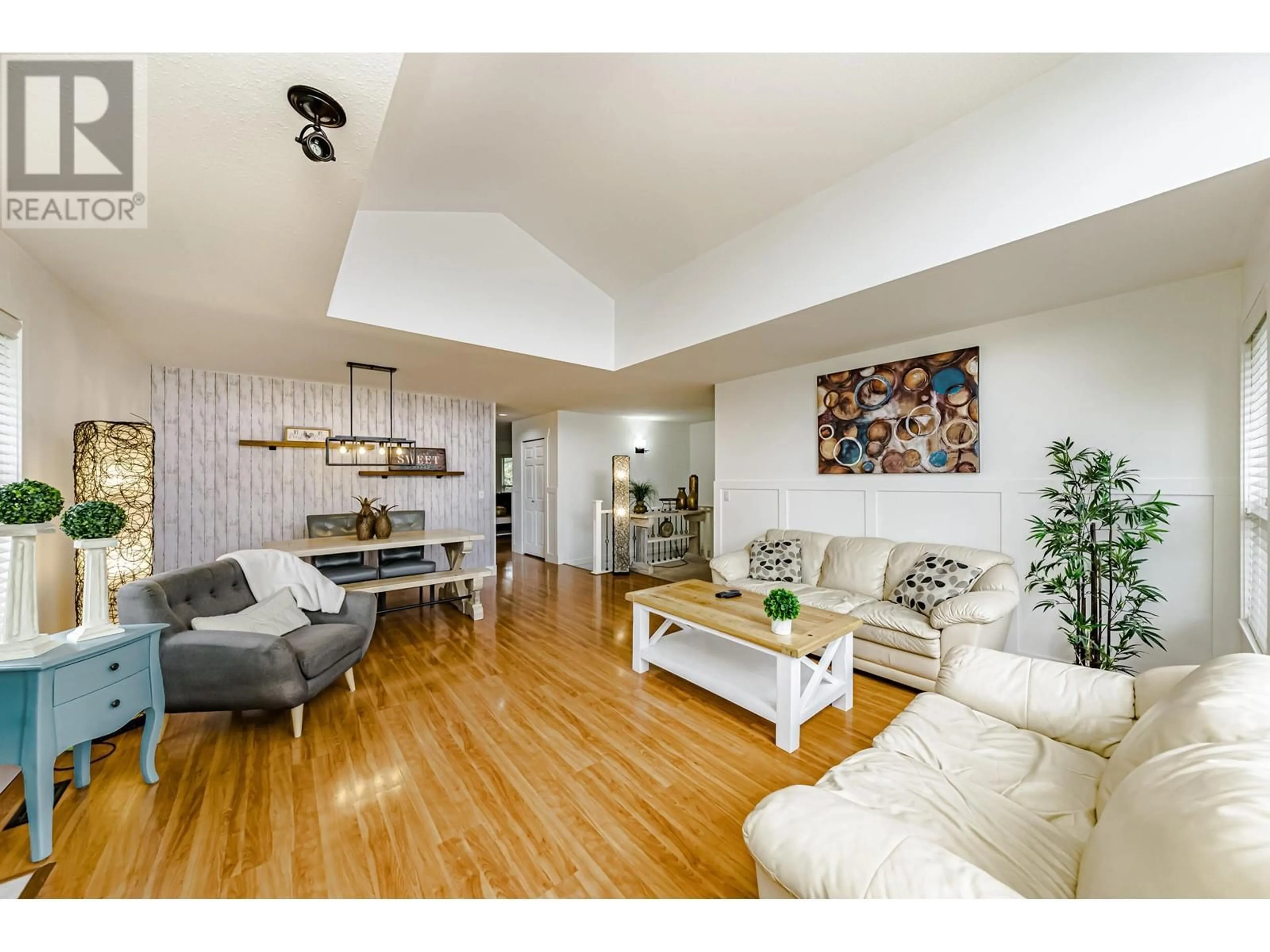 Living room with furniture, wood/laminate floor for 12068 204B STREET, Maple Ridge British Columbia V2X1A9