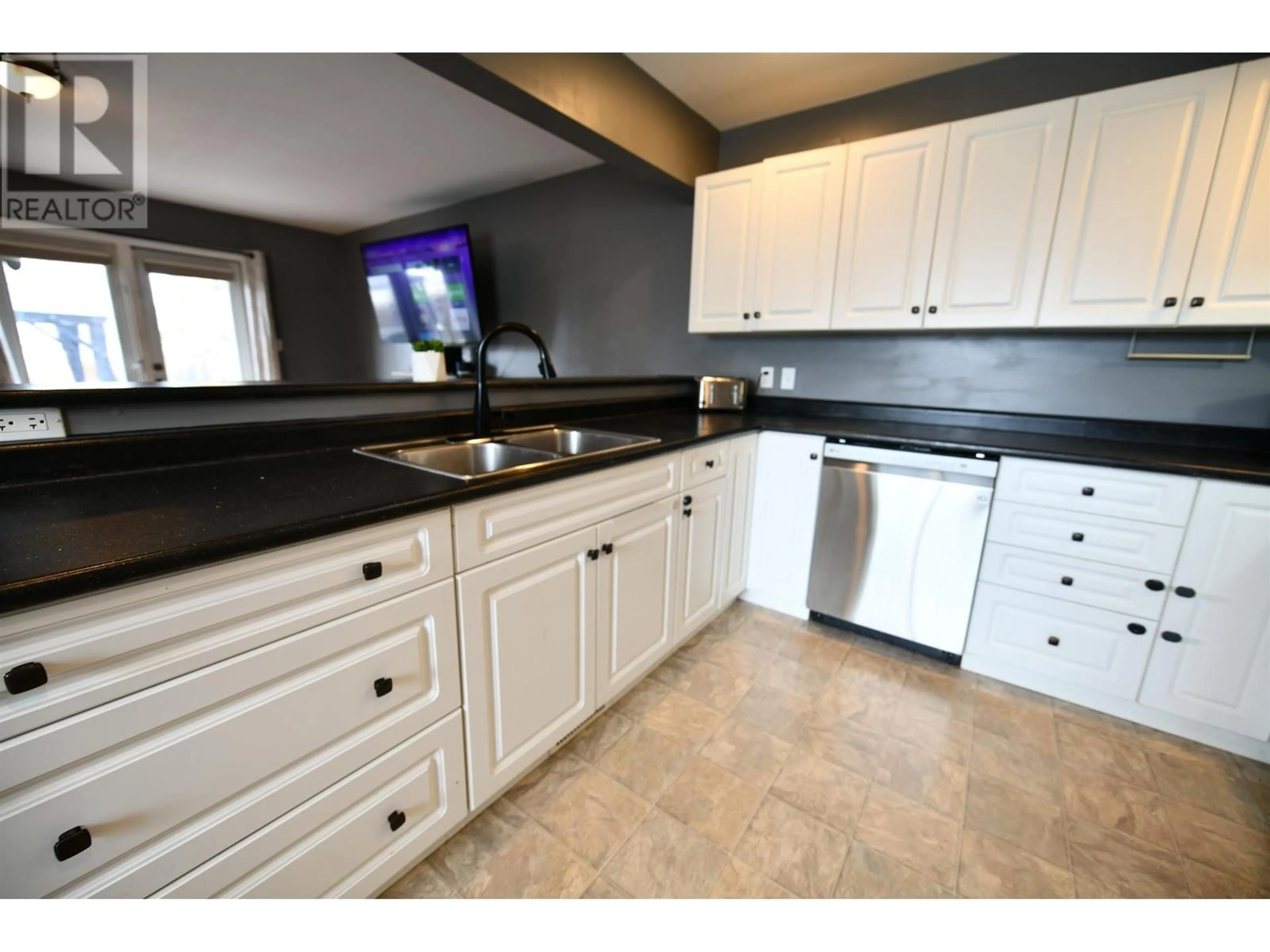 Standard kitchen, ceramic/tile floor for 9206 103 AVENUE, Fort St. John British Columbia V1J2G5