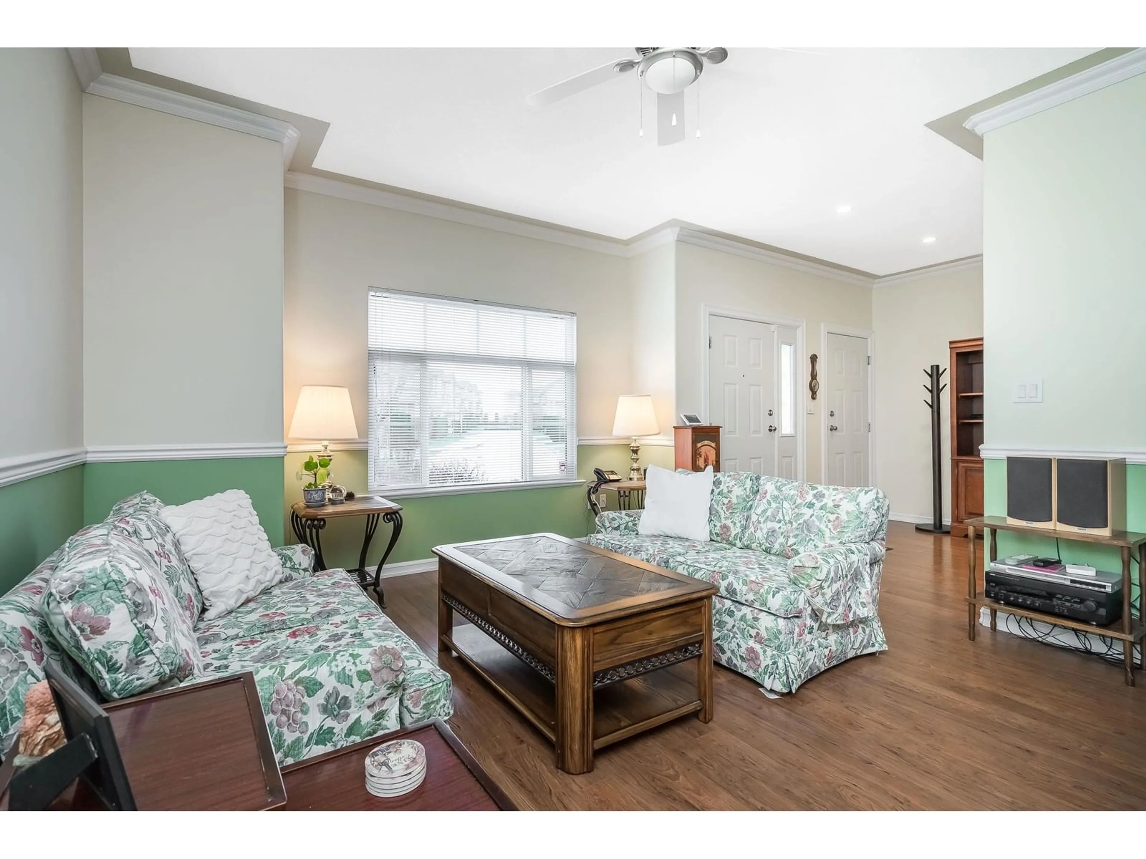 Living room with furniture, wood/laminate floor for 160 33751 7TH AVENUE, Mission British Columbia V2V7C2