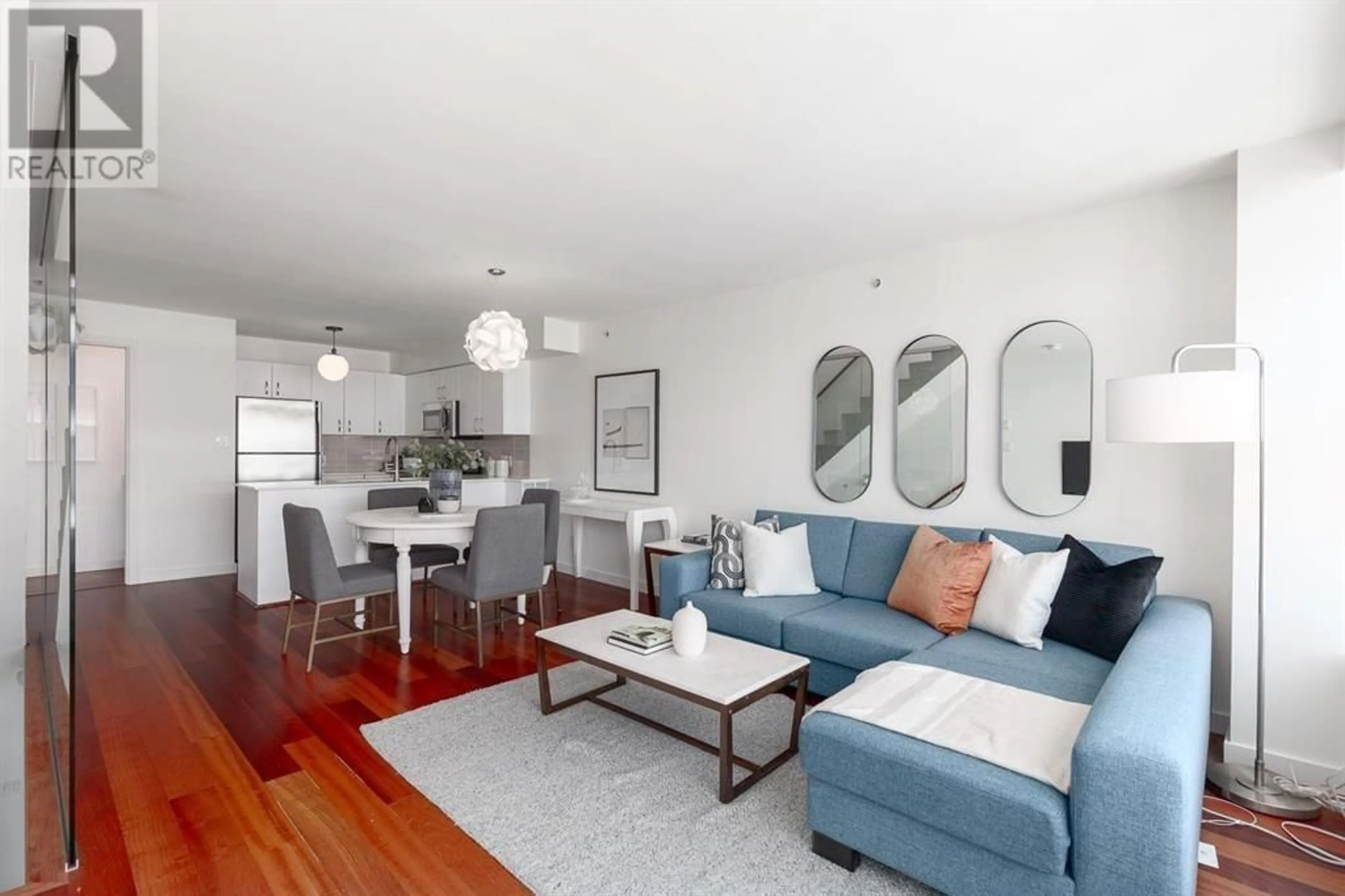Living room with furniture, wood/laminate floor for 3202 - 610 GRANVILLE STREET, Vancouver British Columbia V6C3T3