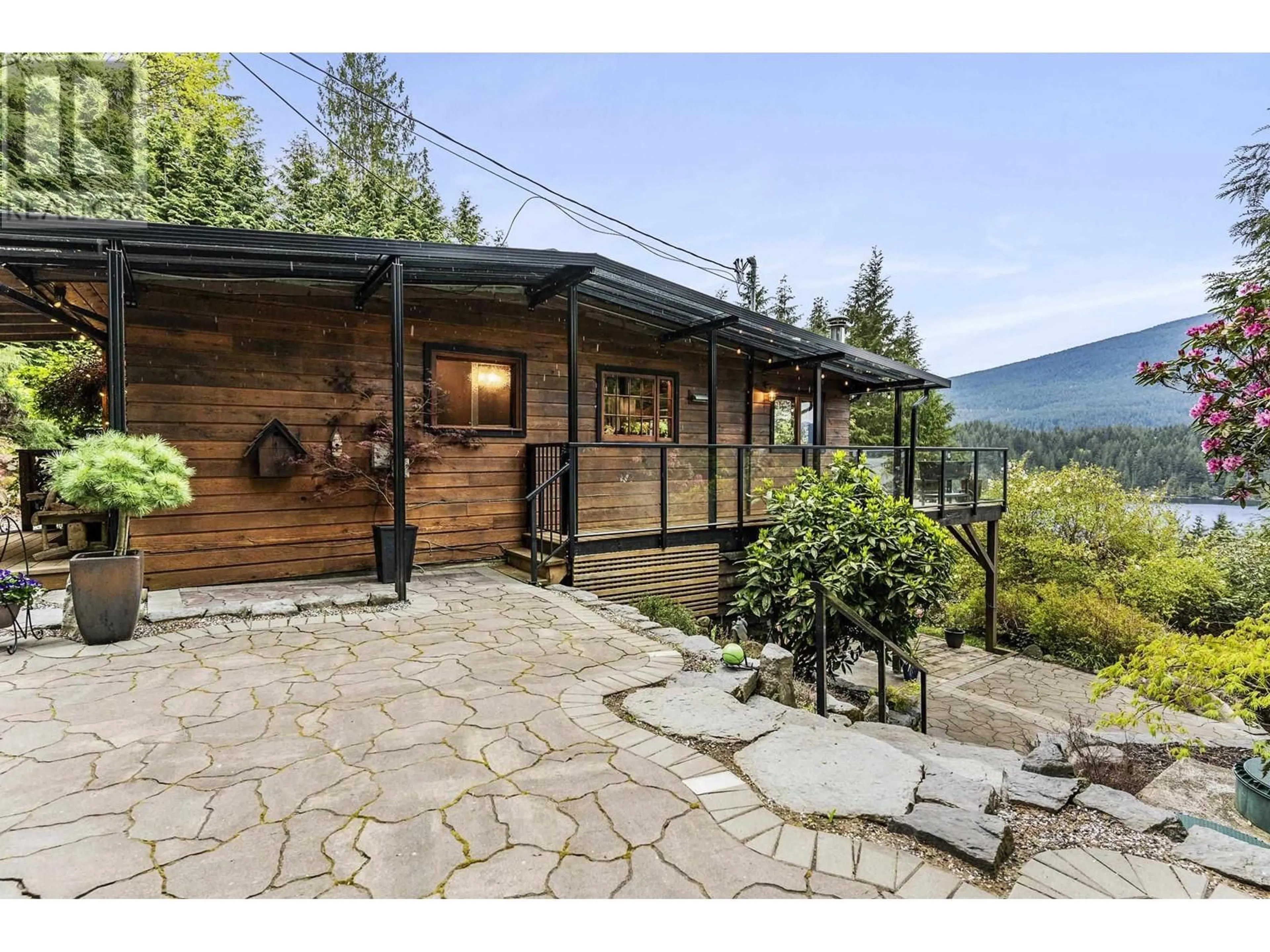 A pic from outside/outdoor area/front of a property/back of a property/a pic from drone, water/lake/river/ocean view for 3543 BEDWELL BAY ROAD, Belcarra British Columbia V3H4R6