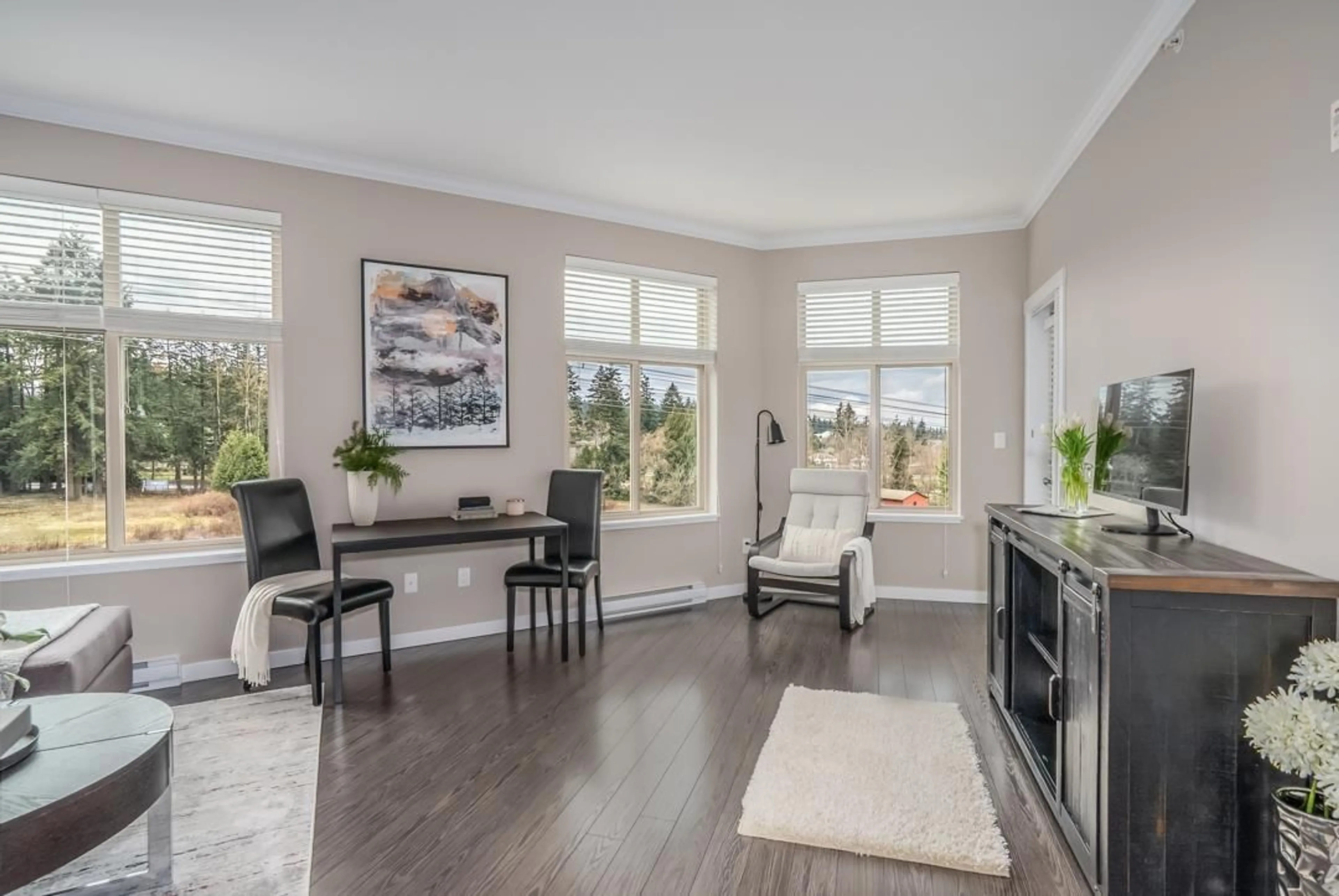 Living room with furniture, wood/laminate floor for 501 - 2855 156, Surrey British Columbia V3Z3Y3