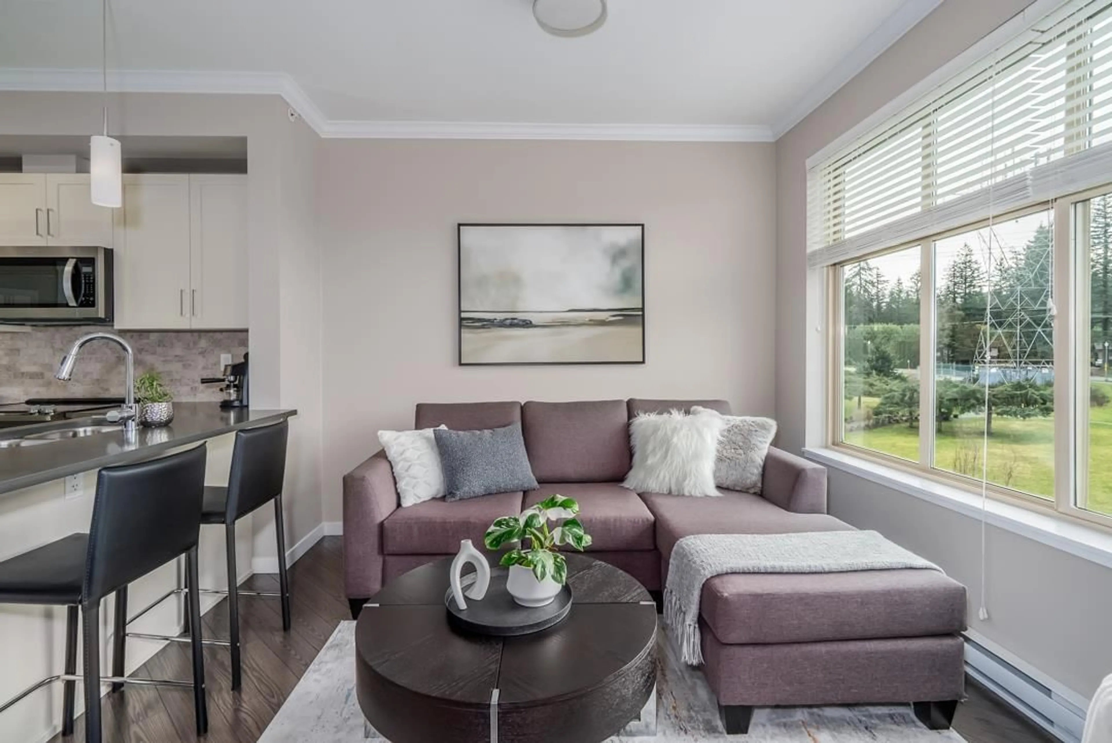 Living room with furniture, wood/laminate floor for 501 - 2855 156, Surrey British Columbia V3Z3Y3