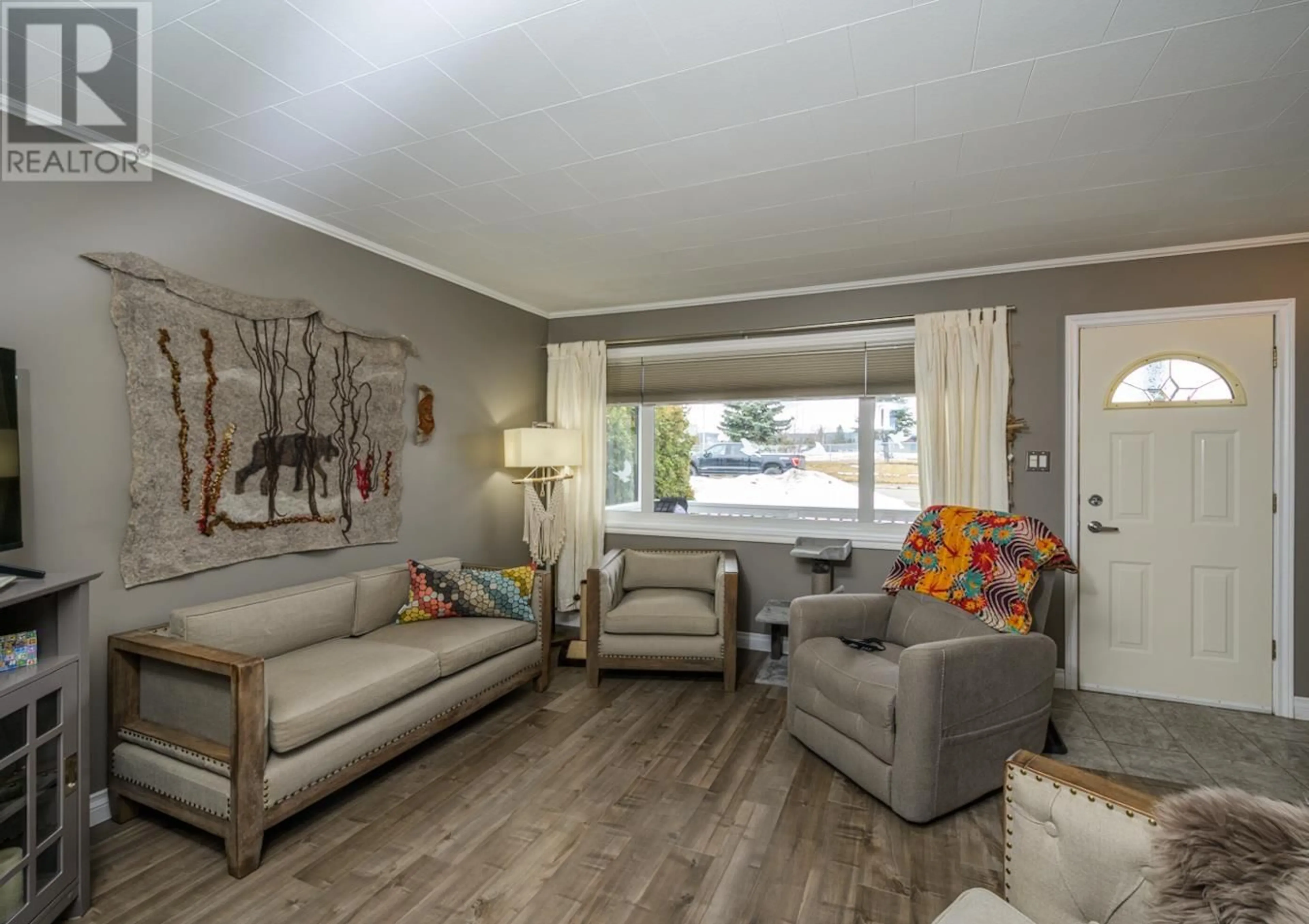 Living room with furniture, wood/laminate floor for 326 GILLETT STREET, Prince George British Columbia V2M2T5