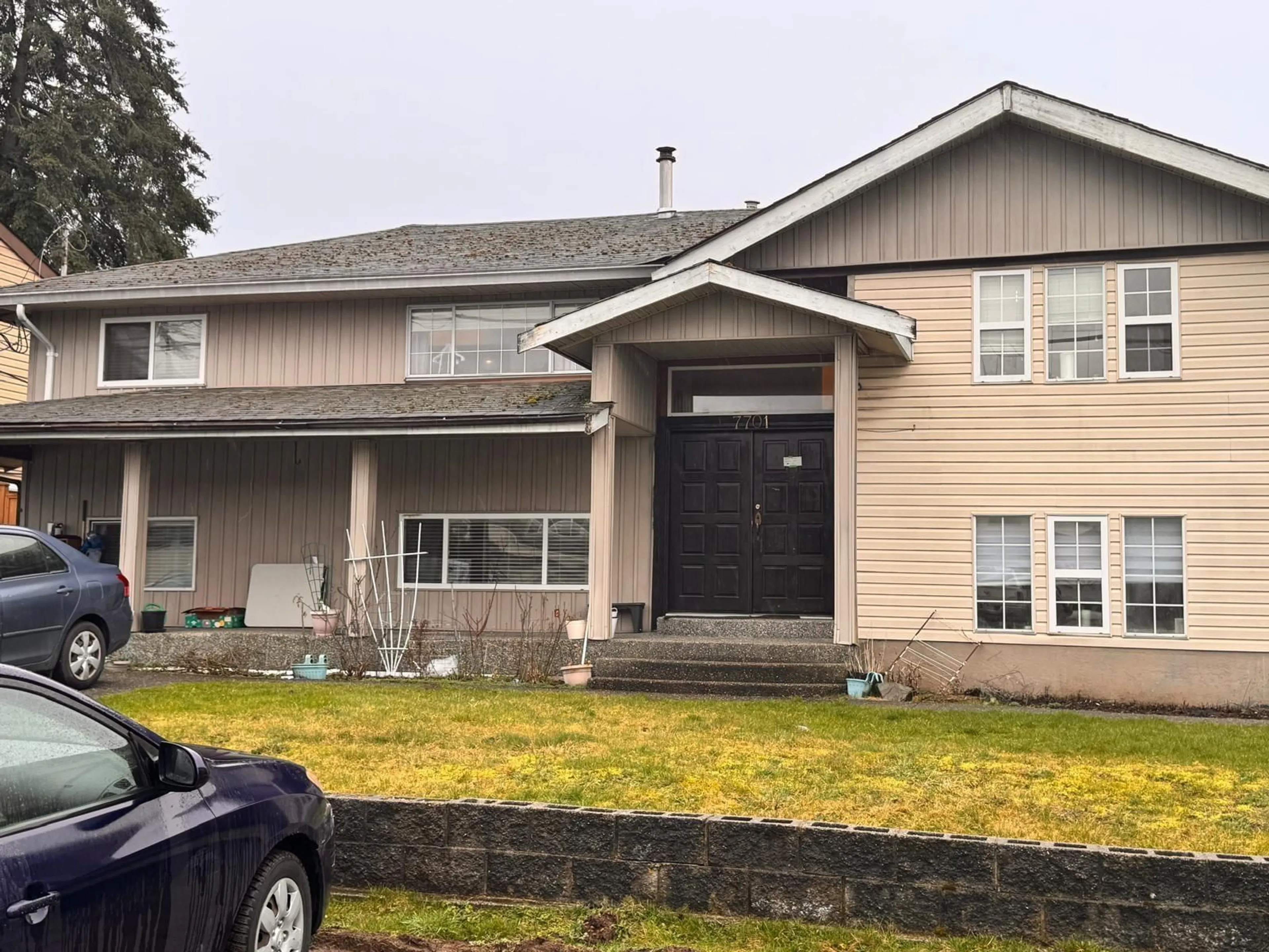 Home with vinyl exterior material, street for 7701 127 STREET, Surrey British Columbia V3W4B1