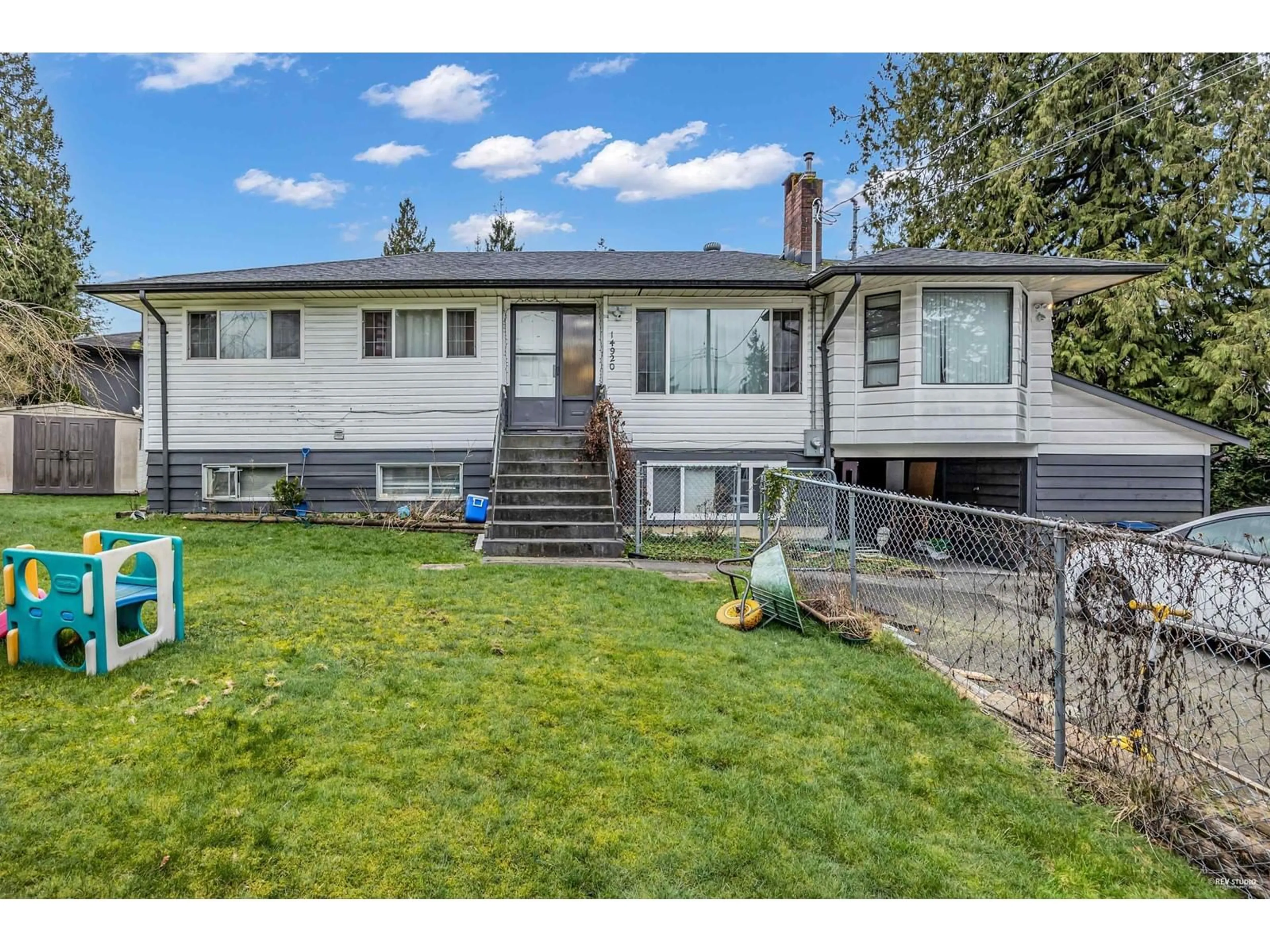 A pic from outside/outdoor area/front of a property/back of a property/a pic from drone, street for 14920 KEW DRIVE, Surrey British Columbia V3R4Y2