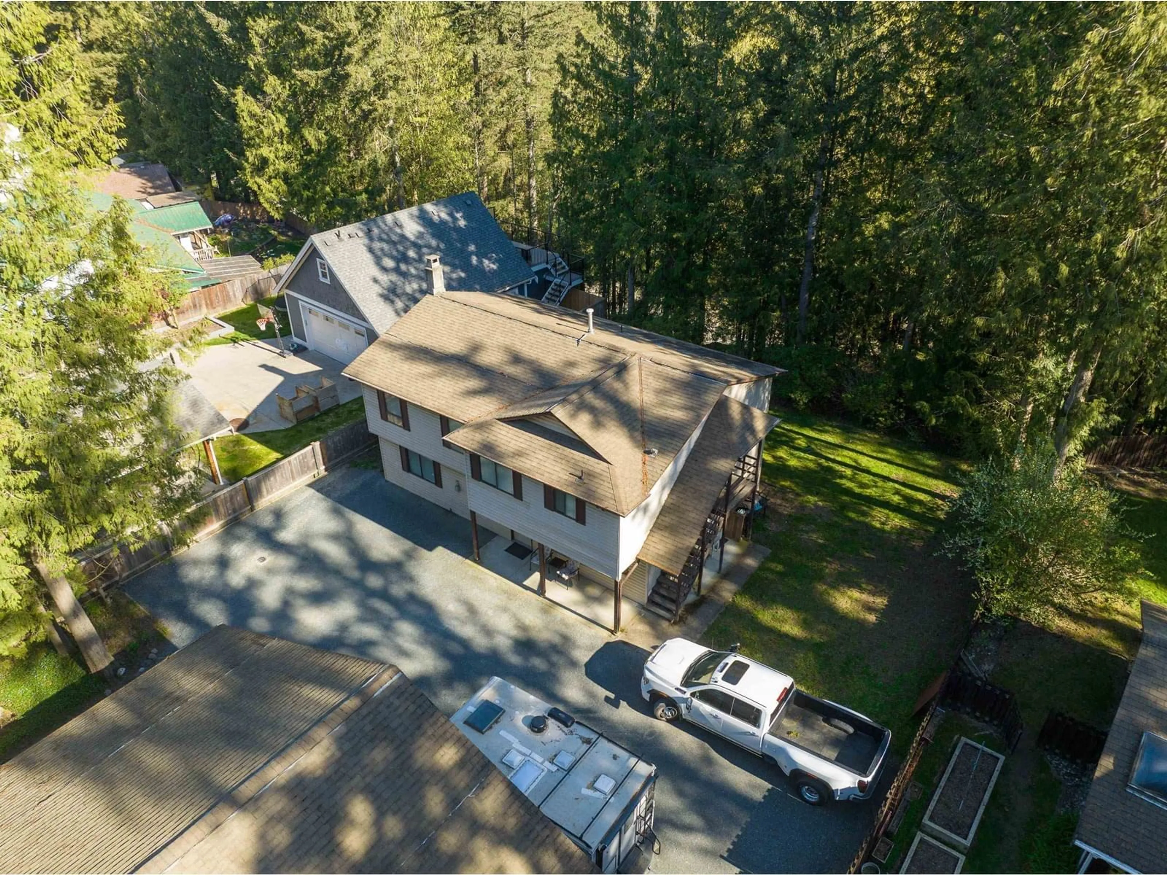 A pic from outside/outdoor area/front of a property/back of a property/a pic from drone, street for 45621 SLEEPY HOLLOW ROAD, Cultus Lake British Columbia V2R5A5