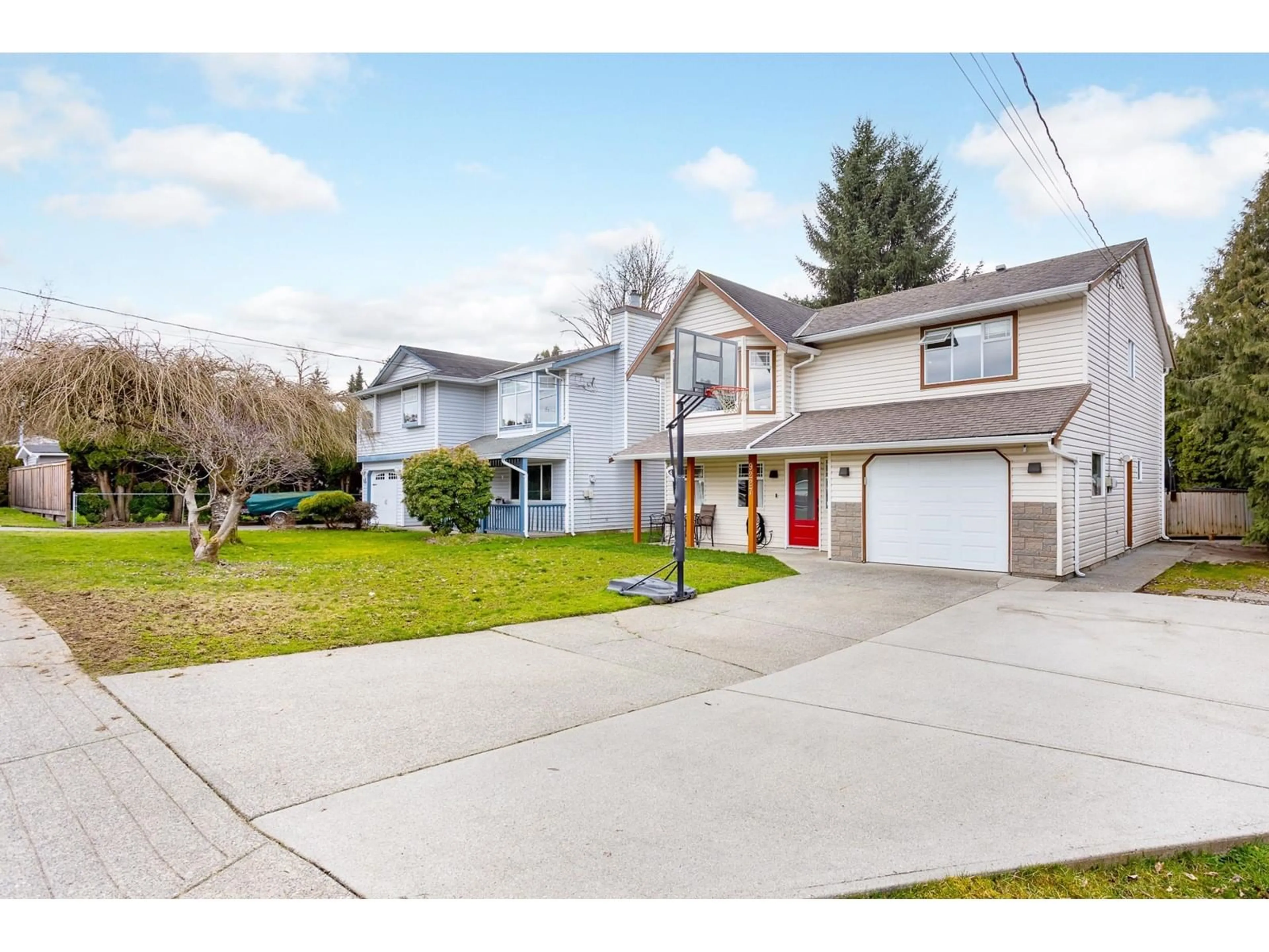 Home with vinyl exterior material, street for 9227 210 STREET, Langley British Columbia V1M2B4