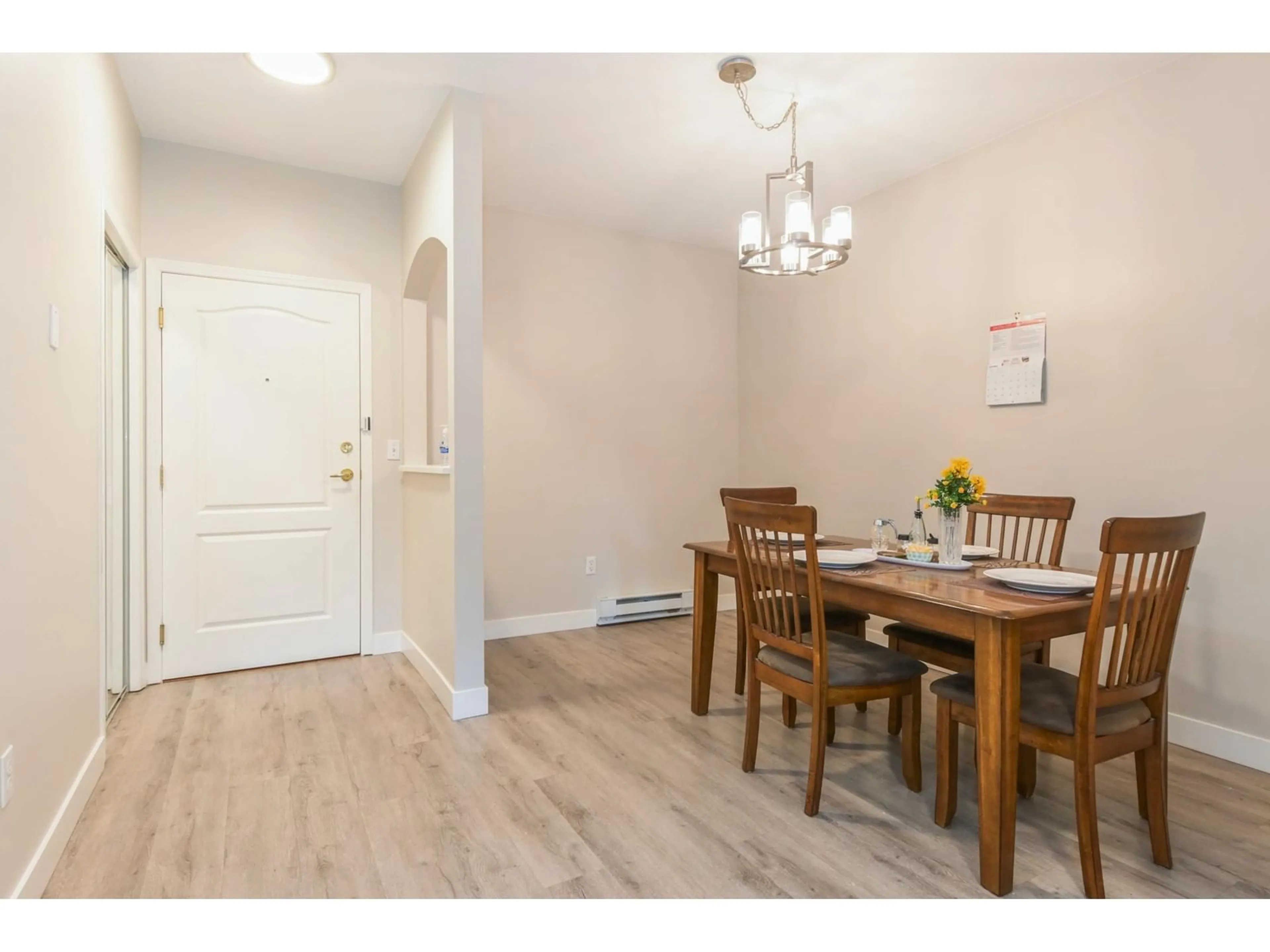 Dining room, wood/laminate floor for 103 - 15298 20, Surrey British Columbia V4A2A3
