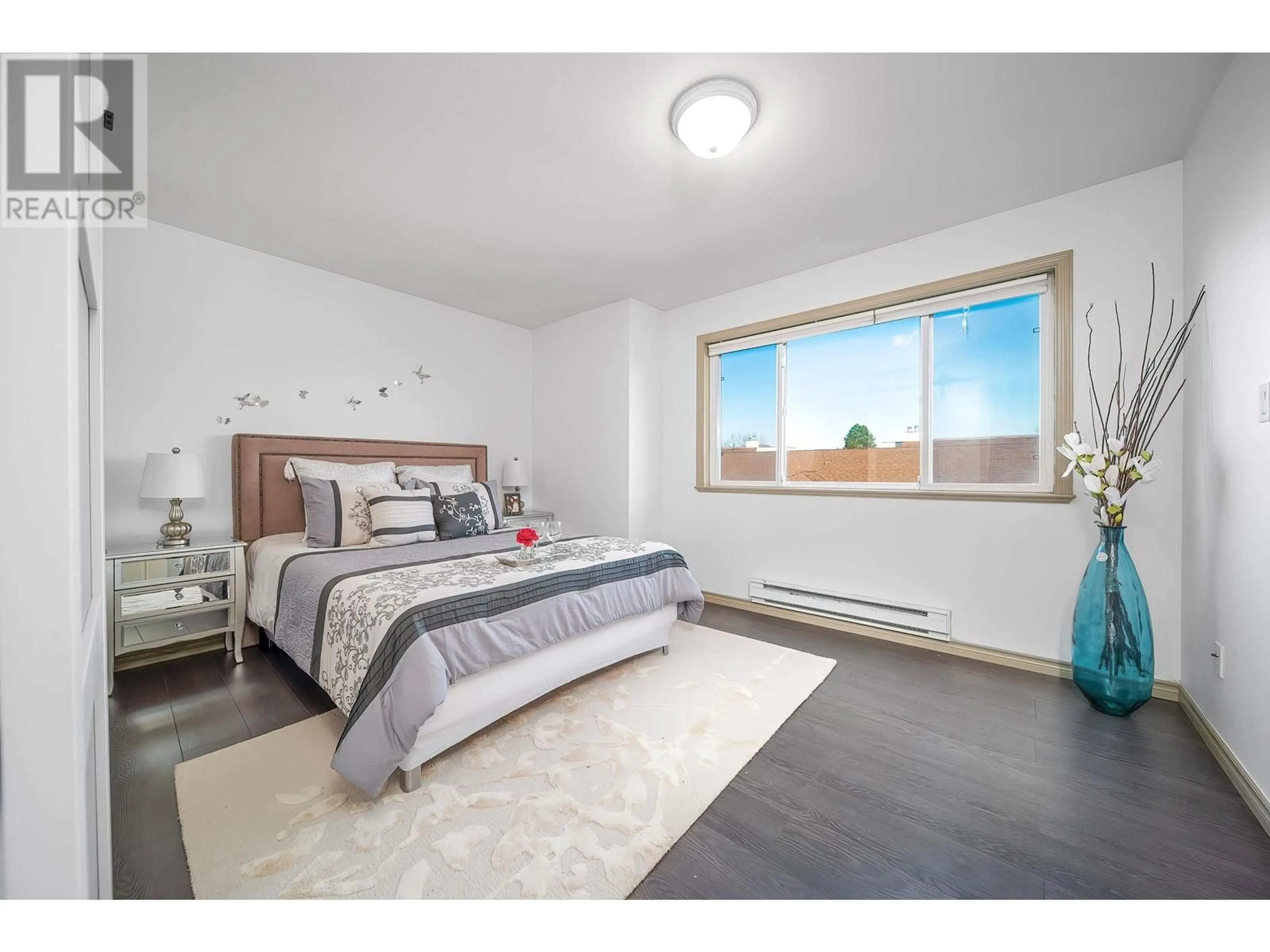 Bedroom with bed, wood/laminate floor for 15 7700 ABERCROMBIE DRIVE, Richmond British Columbia V6Y3X8