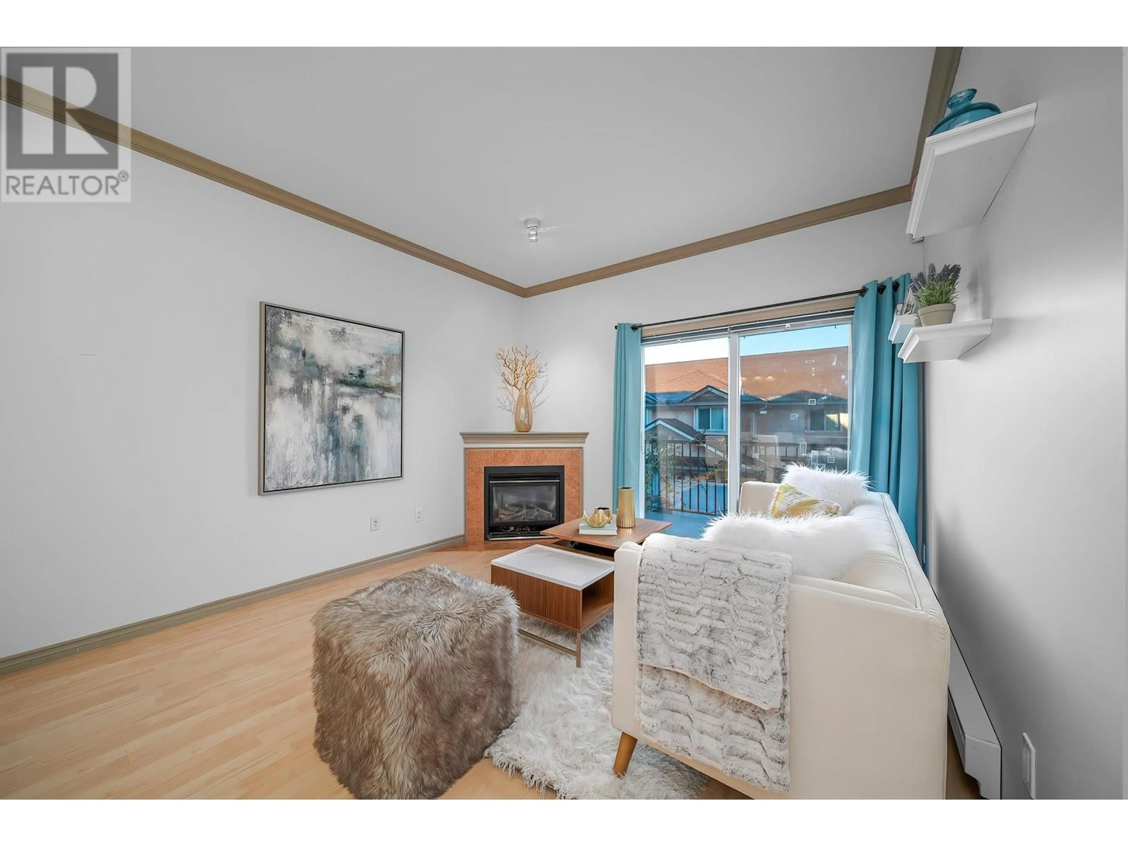 Living room with furniture, wood/laminate floor for 15 7700 ABERCROMBIE DRIVE, Richmond British Columbia V6Y3X8