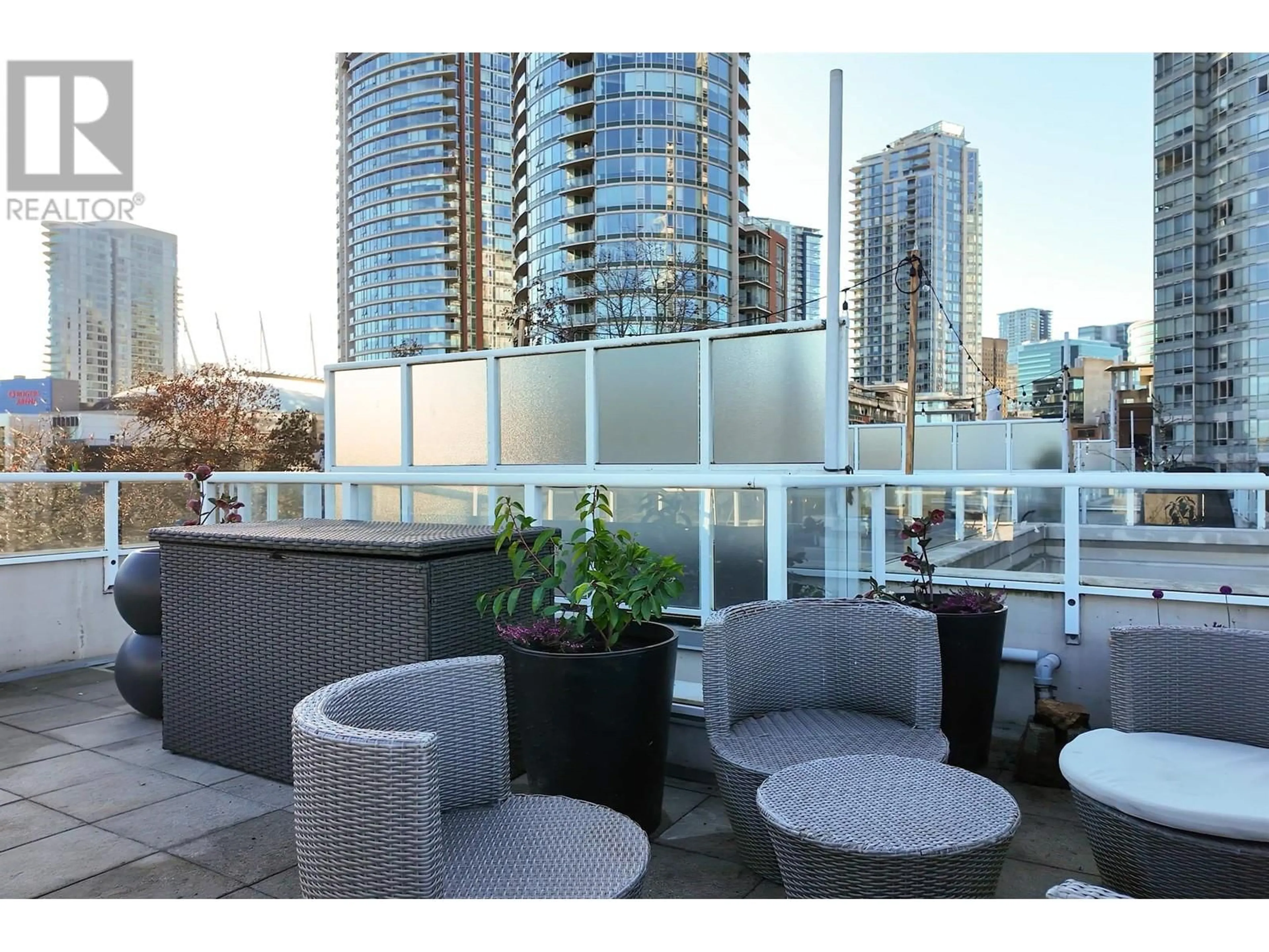 Patio, city buildings view from balcony for TH21 550 TAYLOR STREET, Vancouver British Columbia V6B1R1