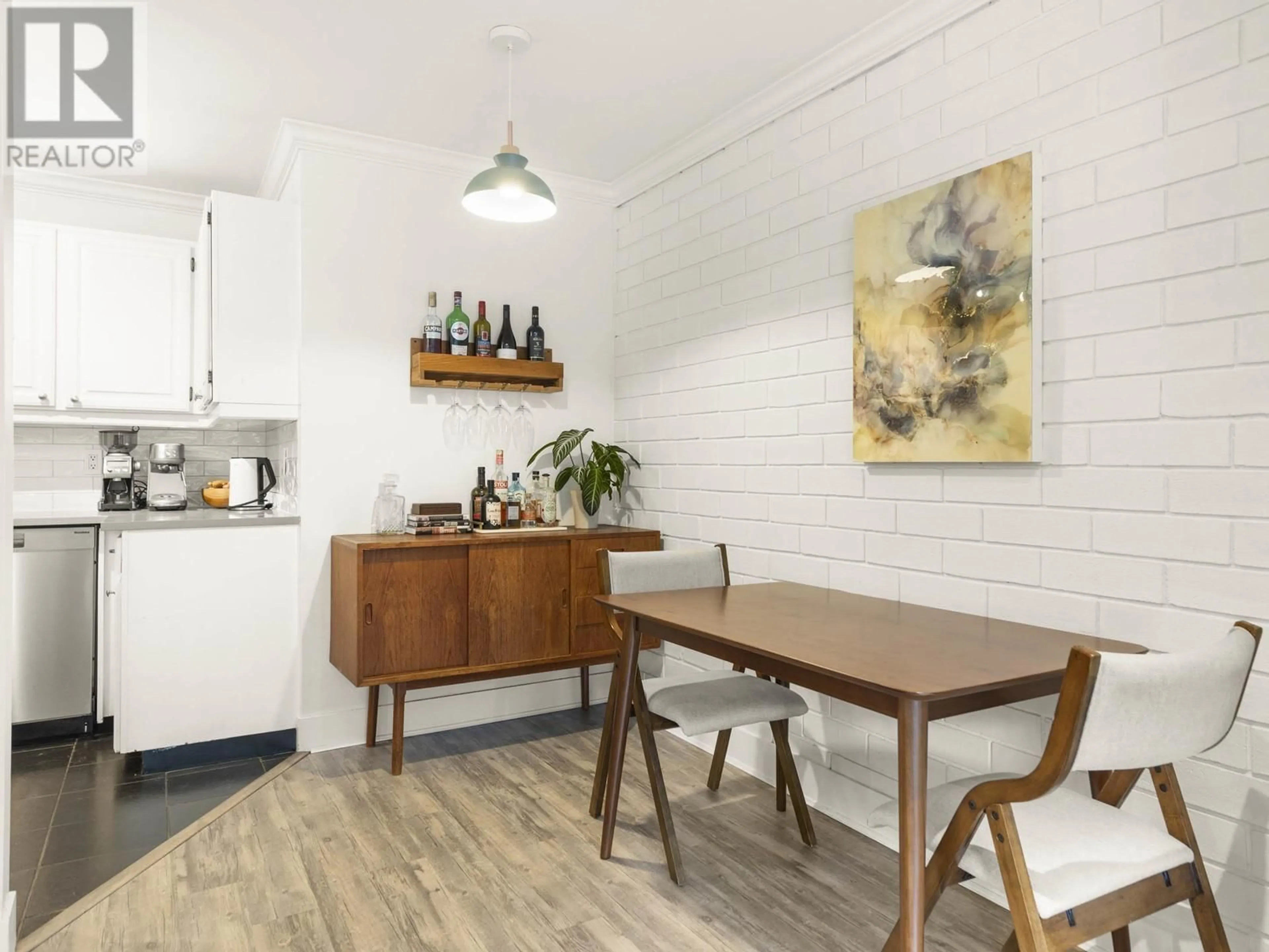 Dining room, wood/laminate floor for 211 2366 WALL STREET, Vancouver British Columbia V5L4Y1