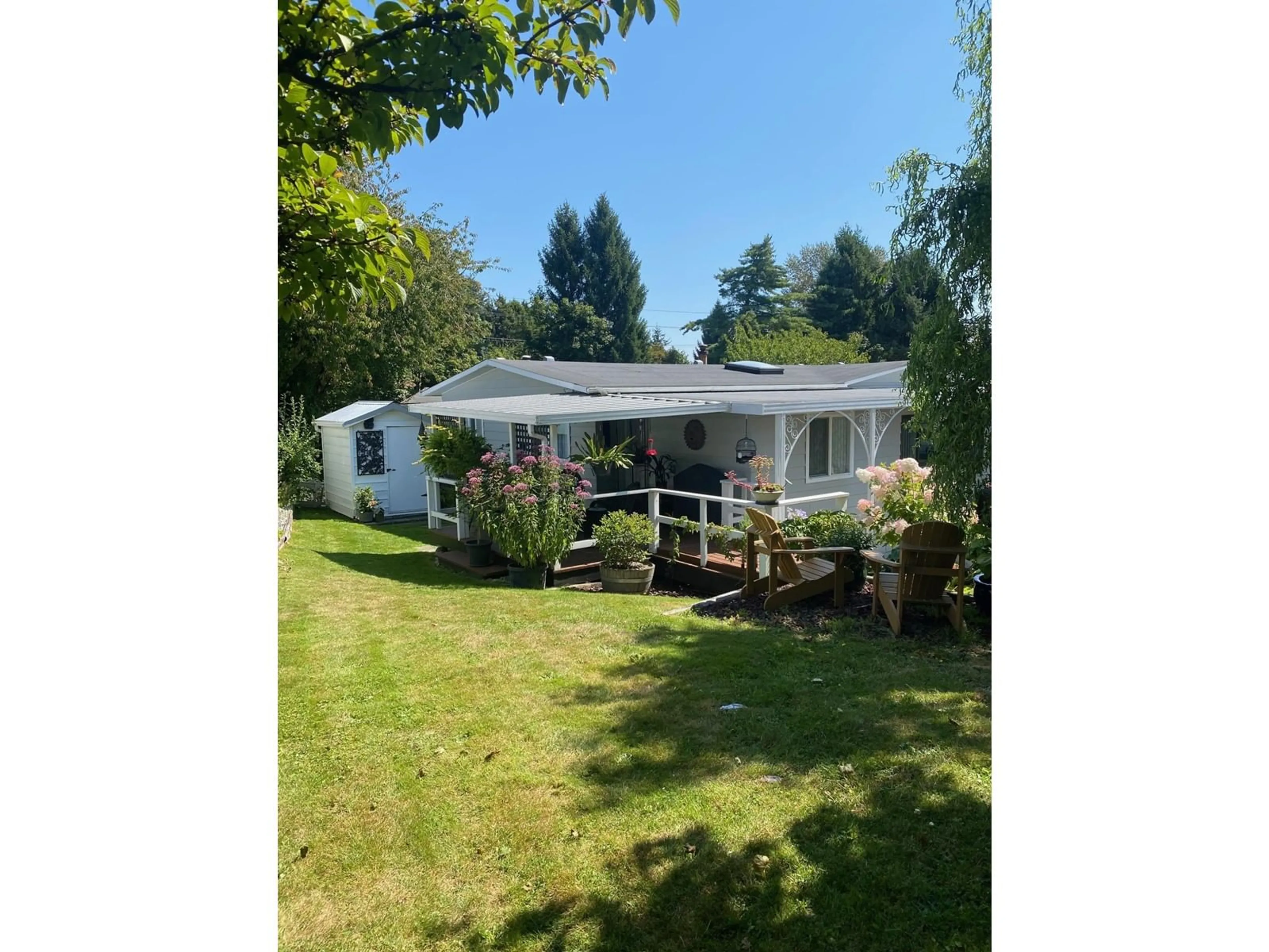 A pic from outside/outdoor area/front of a property/back of a property/a pic from drone, unknown for 113 15875 20 AVENUE, Surrey British Columbia V4A2B1