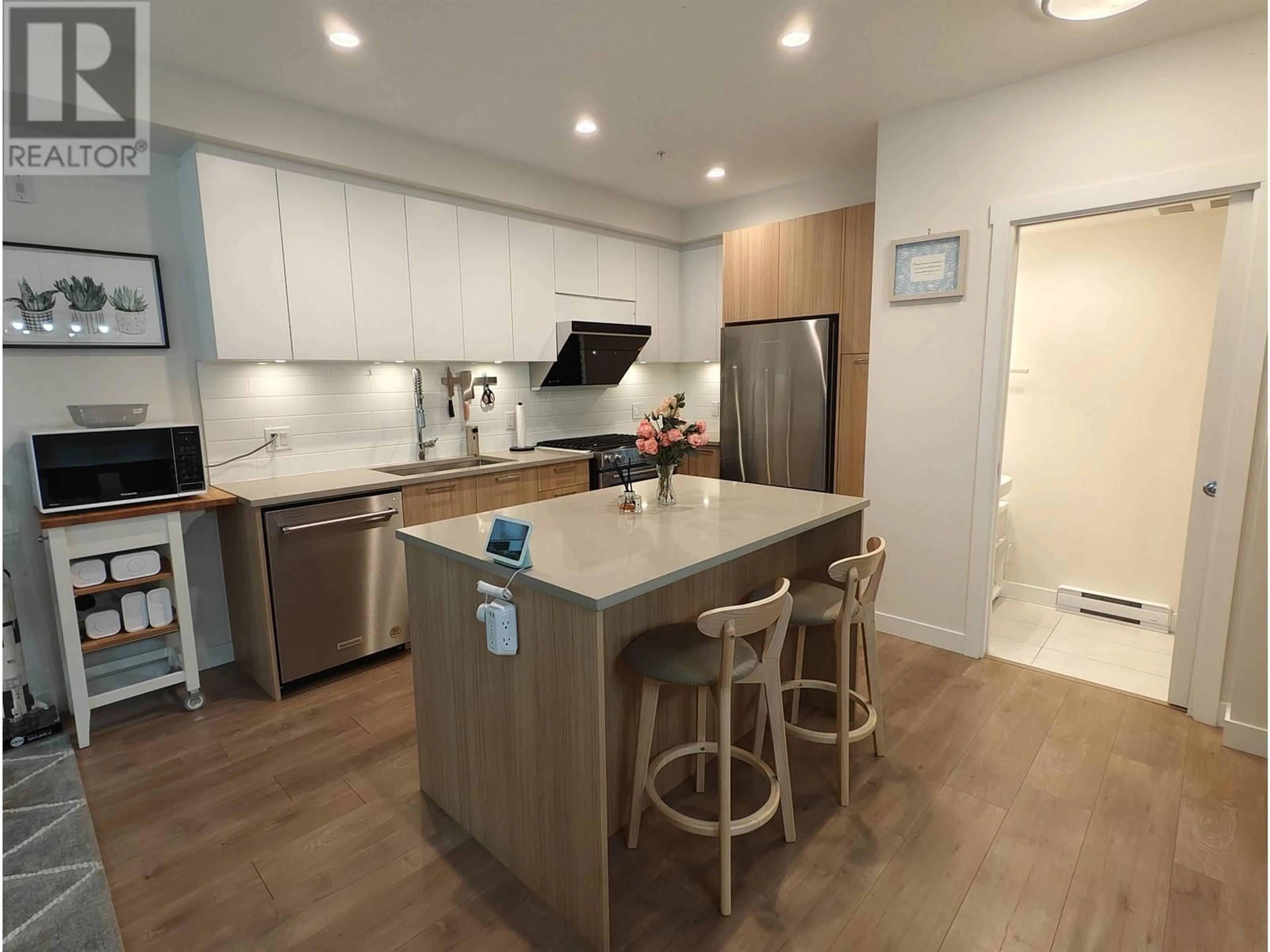 Open concept kitchen, wood/laminate floor for 227 - 708 LEA AVENUE, Coquitlam British Columbia V3J4H5