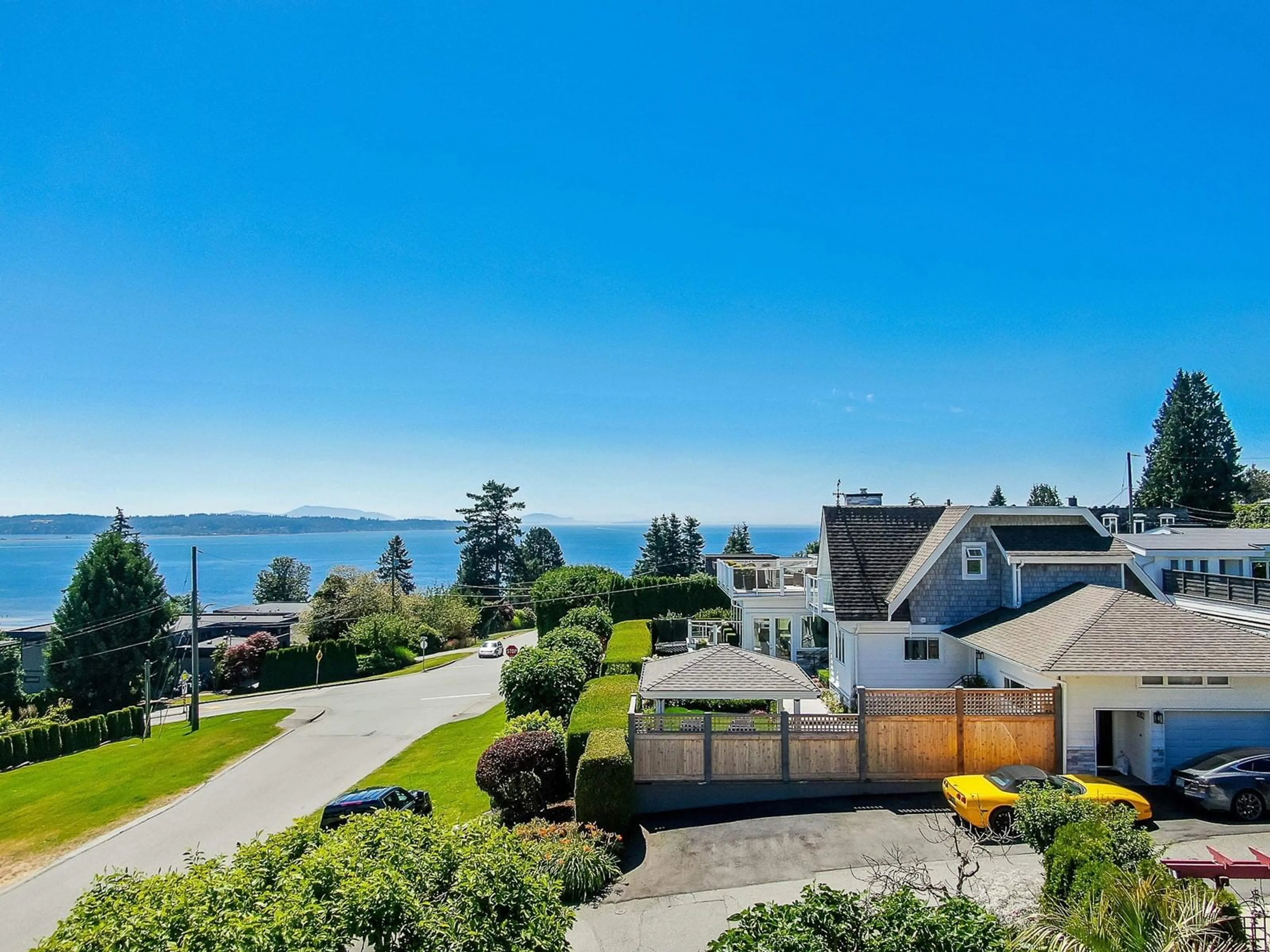 A pic from outside/outdoor area/front of a property/back of a property/a pic from drone, water/lake/river/ocean view for 1085 BALSAM, White Rock British Columbia V4B4J4