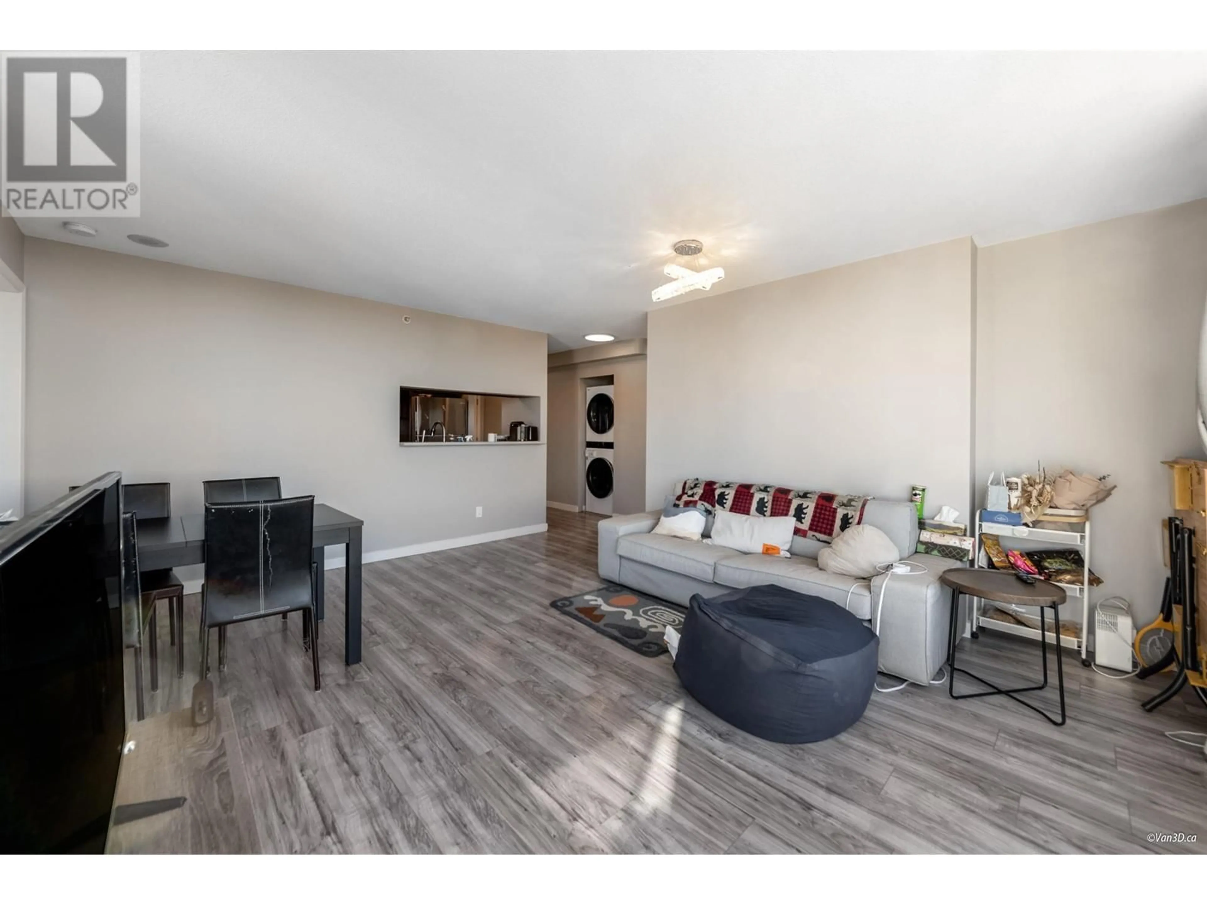 Living room with furniture, wood/laminate floor for 1904 5189 GASTON STREET, Vancouver British Columbia V5R6C7