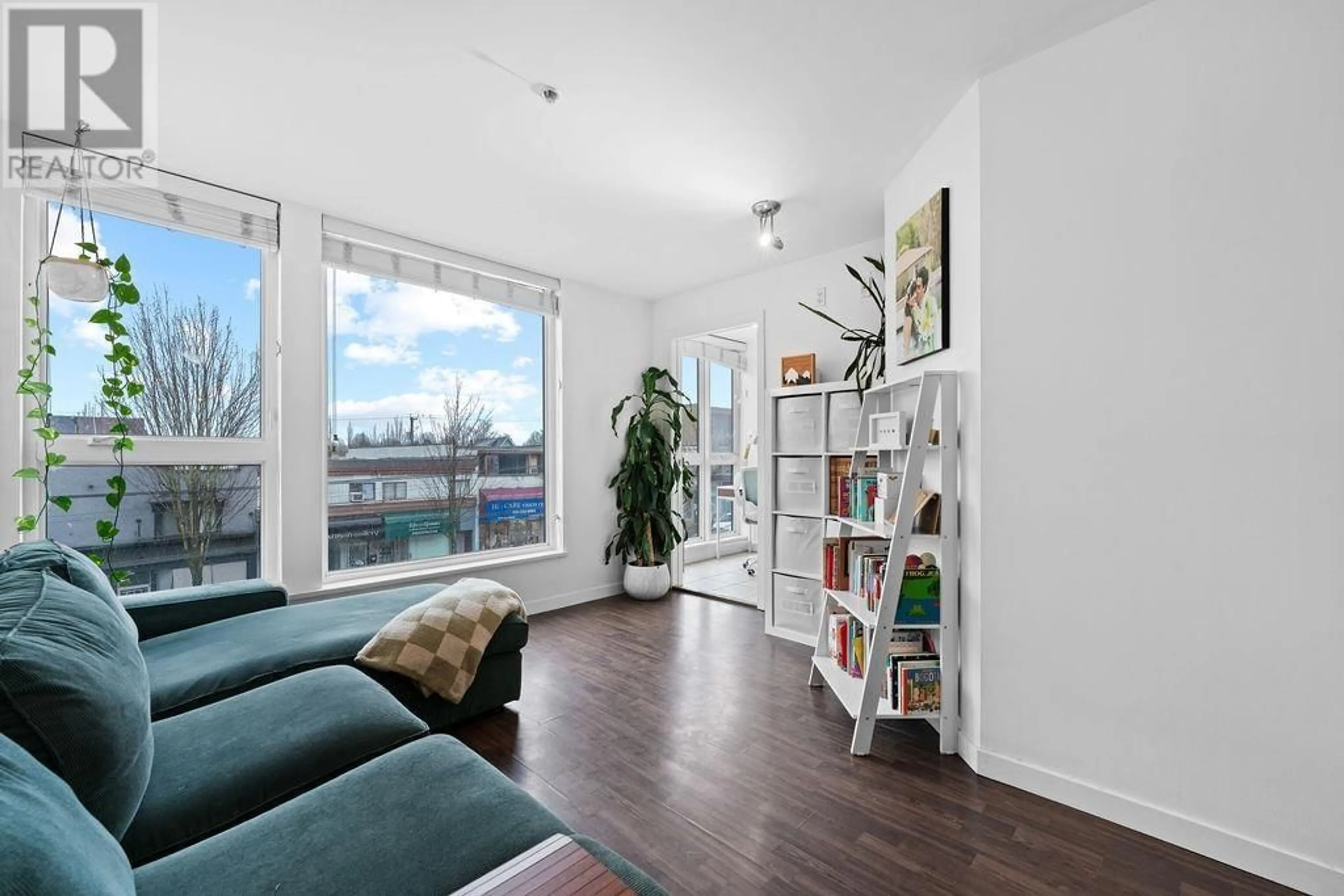 Living room with furniture, wood/laminate floor for 306 2636 E HASTINGS STREET, Vancouver British Columbia V5K0A4