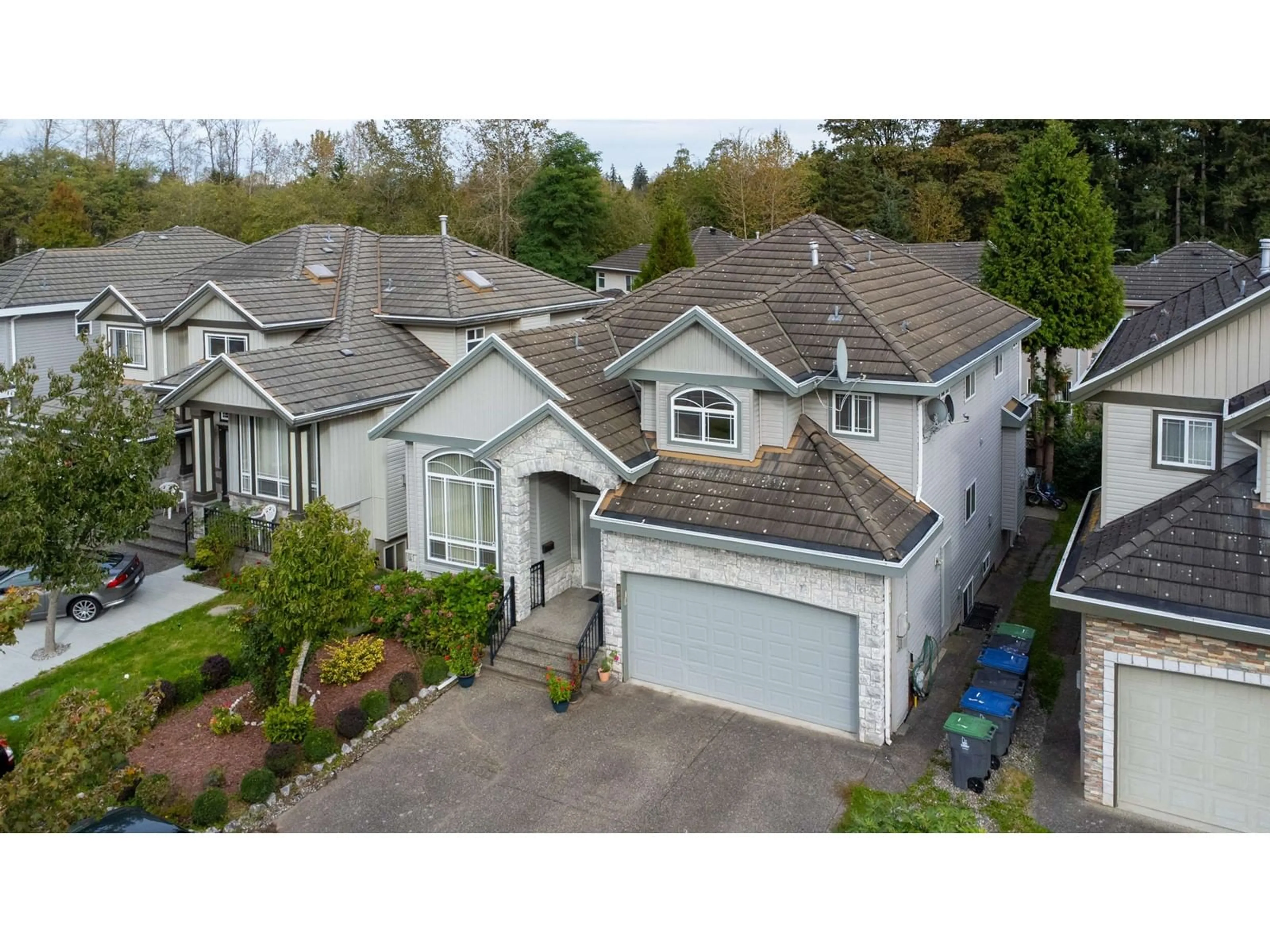 A pic from outside/outdoor area/front of a property/back of a property/a pic from drone, street for 8358 144 STREET, Surrey British Columbia V3W5T5