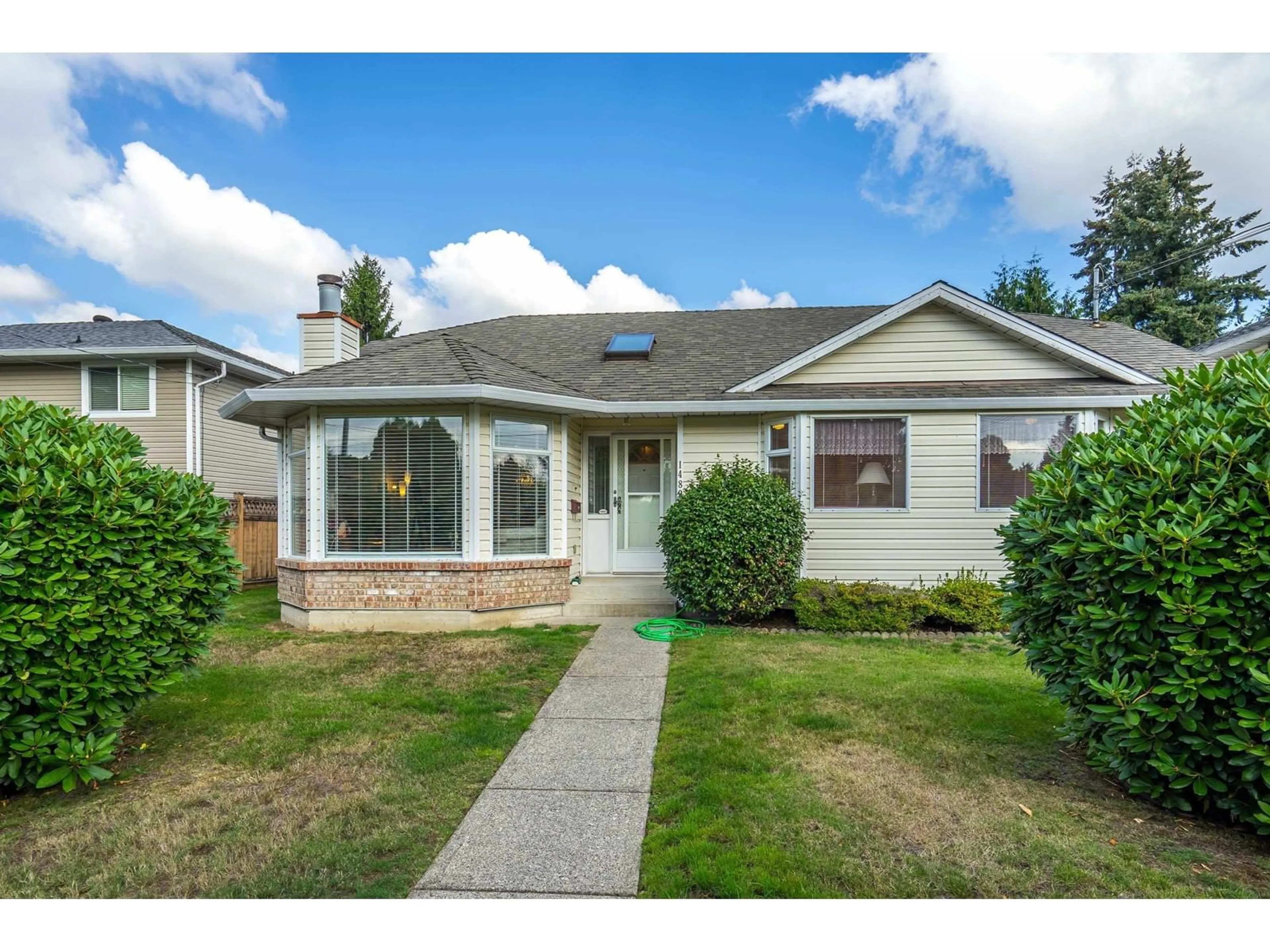 Home with vinyl exterior material, street for 14895 96, Surrey British Columbia V3R1E8
