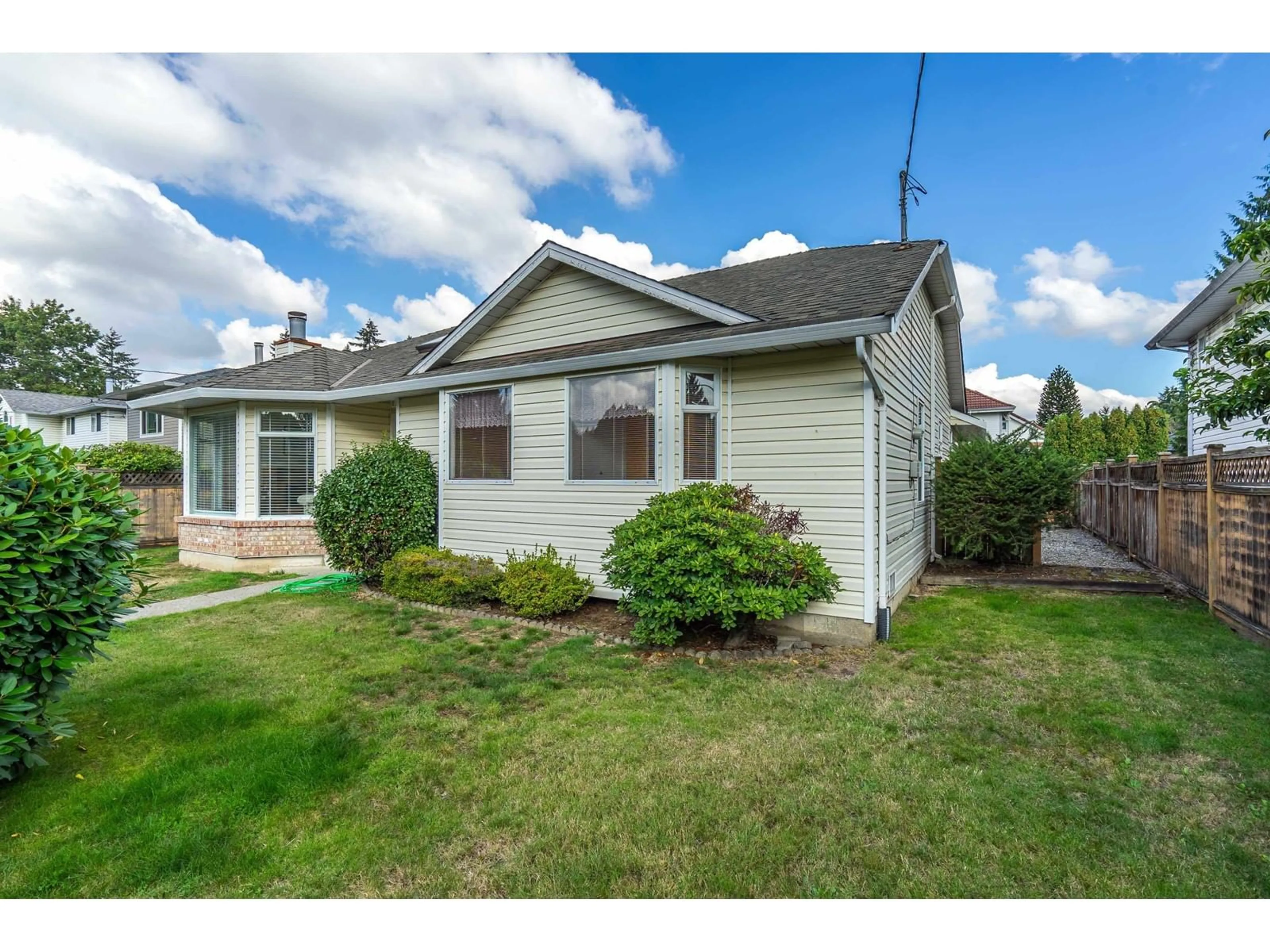 Home with vinyl exterior material, street for 14895 96, Surrey British Columbia V3R1E8