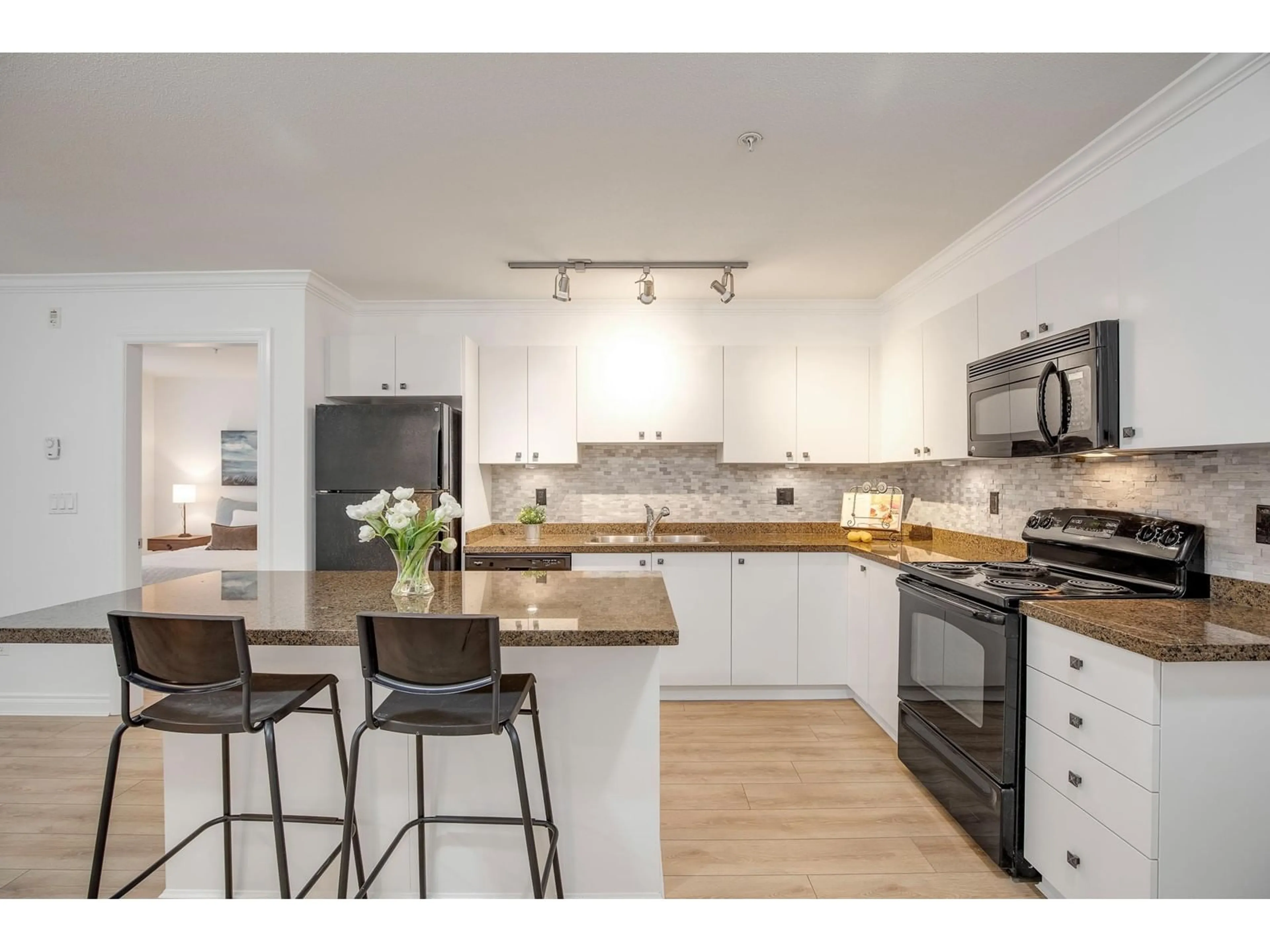 Open concept kitchen, unknown for 205 8717 160 STREET, Surrey British Columbia V4N5X7