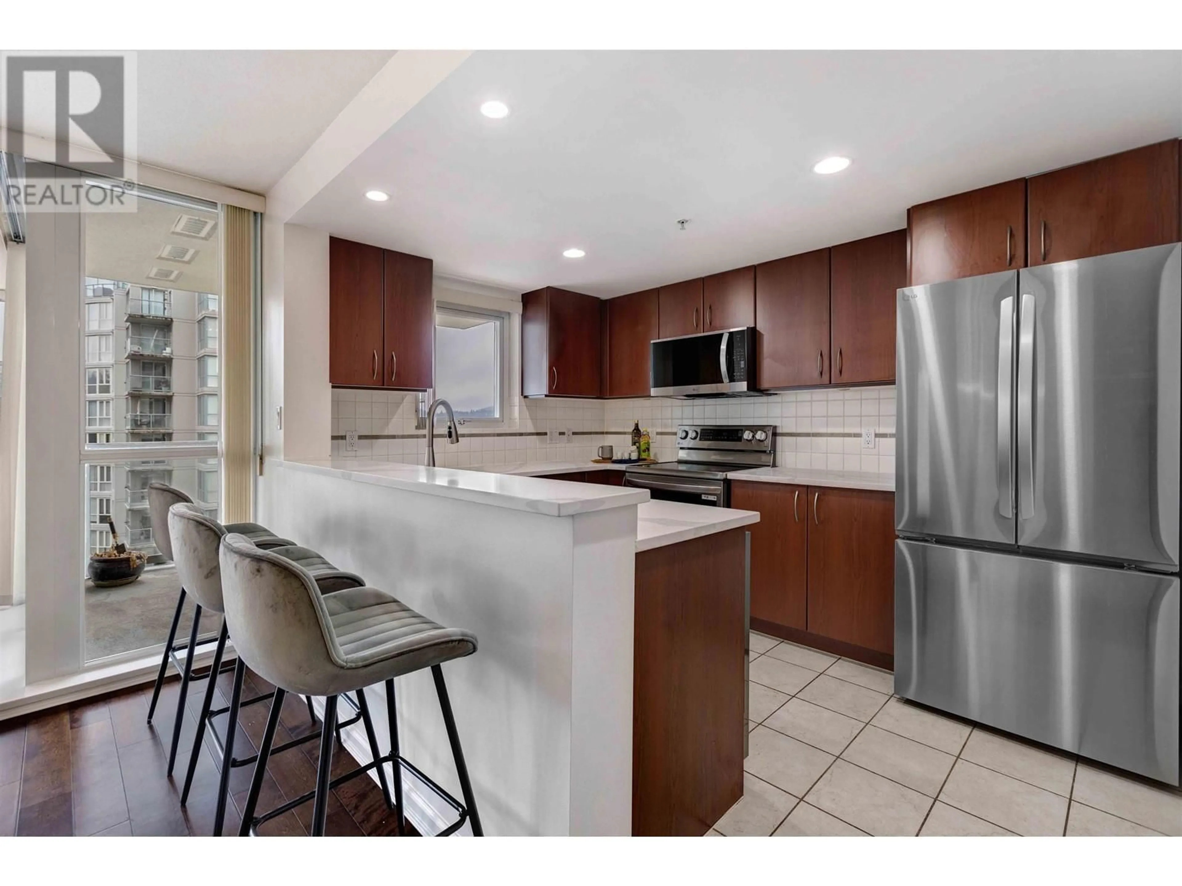 Open concept kitchen, ceramic/tile floor for 1103 235 GUILDFORD WAY, Port Moody British Columbia V3H5L8