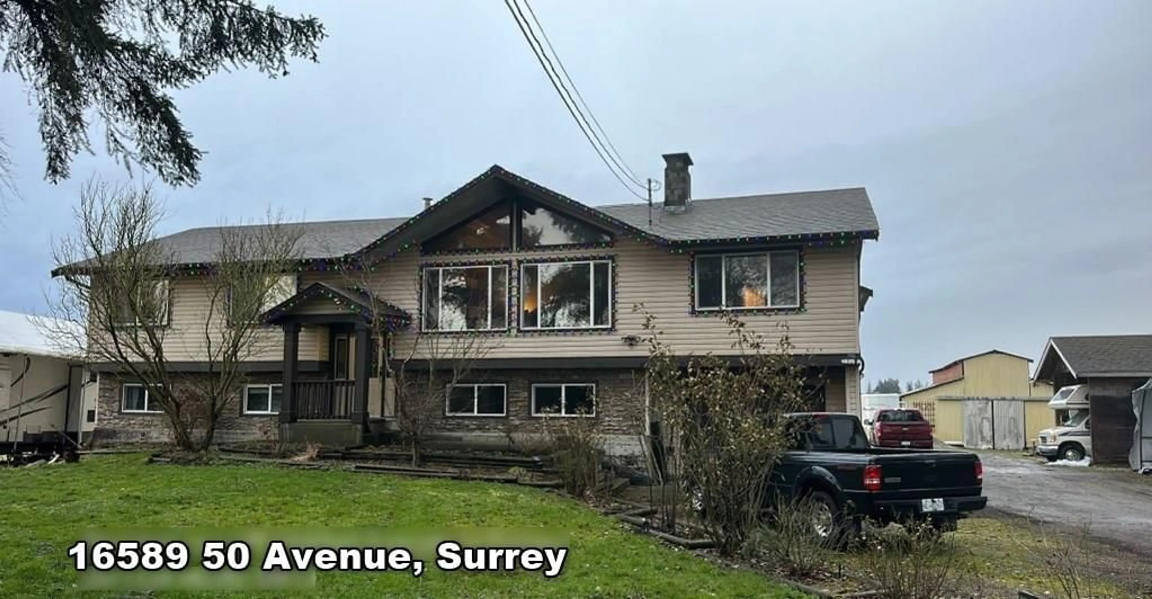 A pic from outside/outdoor area/front of a property/back of a property/a pic from drone, street for 16589 50, Surrey British Columbia V3S0L2