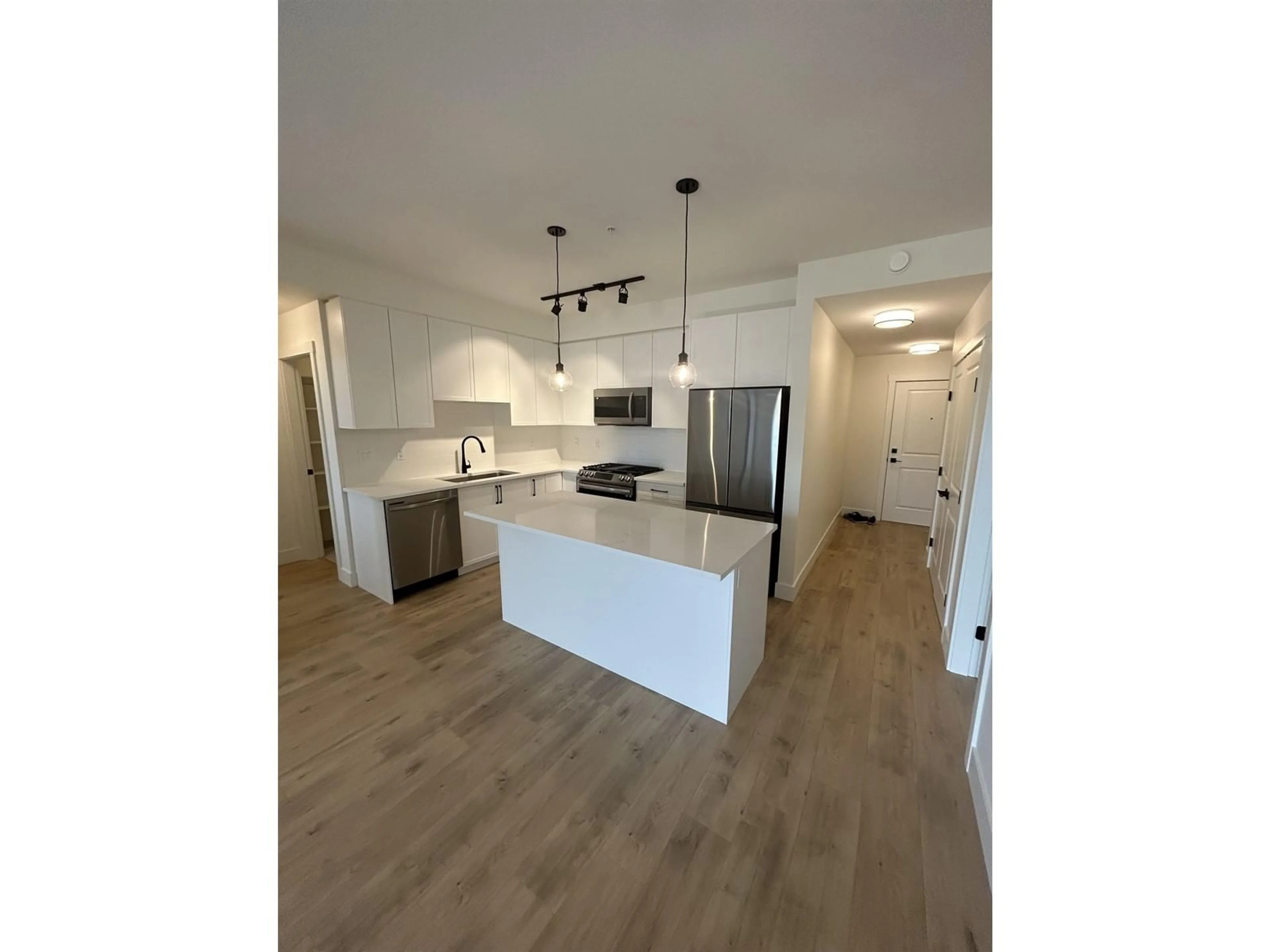 Open concept kitchen, unknown for 301 7506 199A STREET, Langley British Columbia V2Y3K9