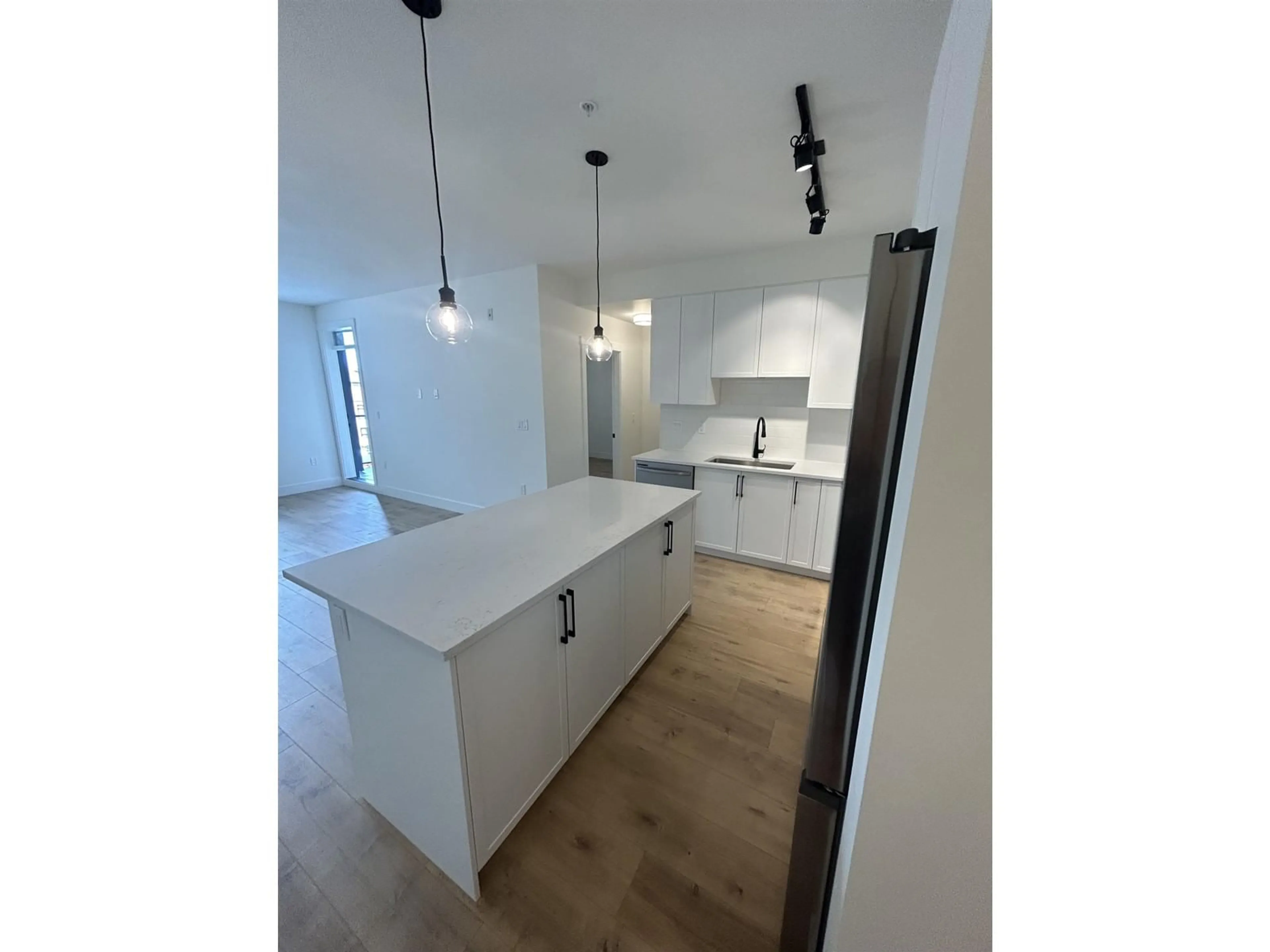 Open concept kitchen, unknown for 301 7506 199A STREET, Langley British Columbia V2Y3K9